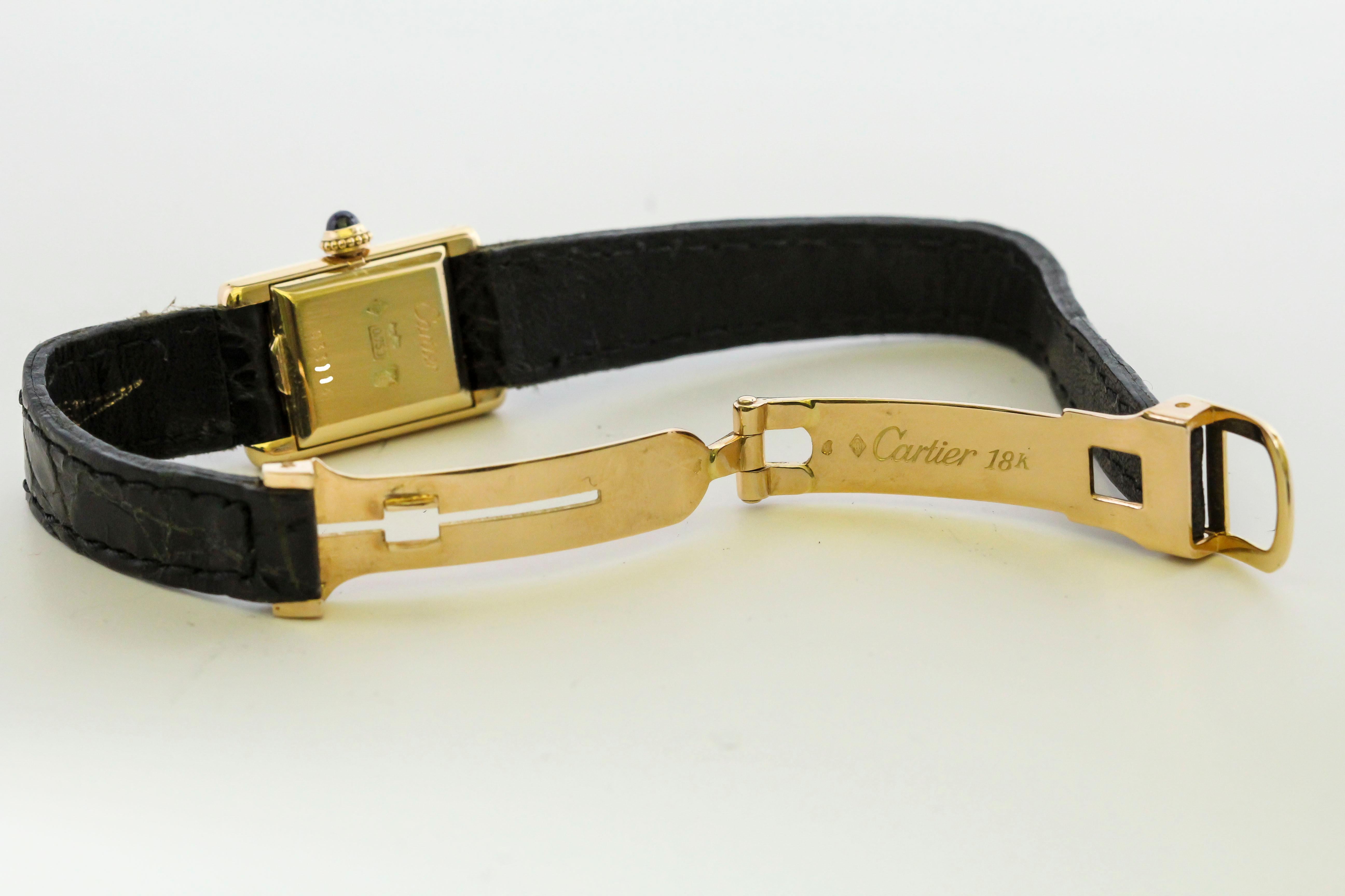 Women's Cartier Paris Ladies Yellow Gold Mini Tank manual wind Wristwatch, circa 1960s