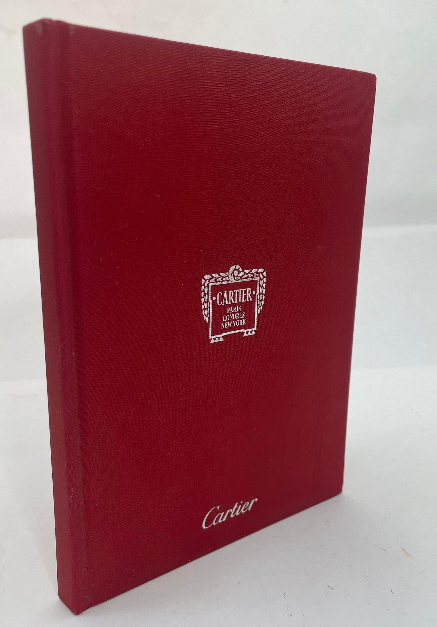 Cartier Red Jewelry Book English Edition Hardcover Small Book.
80 pages of beautiful iconic jewelry and the history of Cartier.
In good condition showing only minor wear on cover. Interior pages are excellent.
Dimensions: 8.5 in x 6 in.
Cartier was