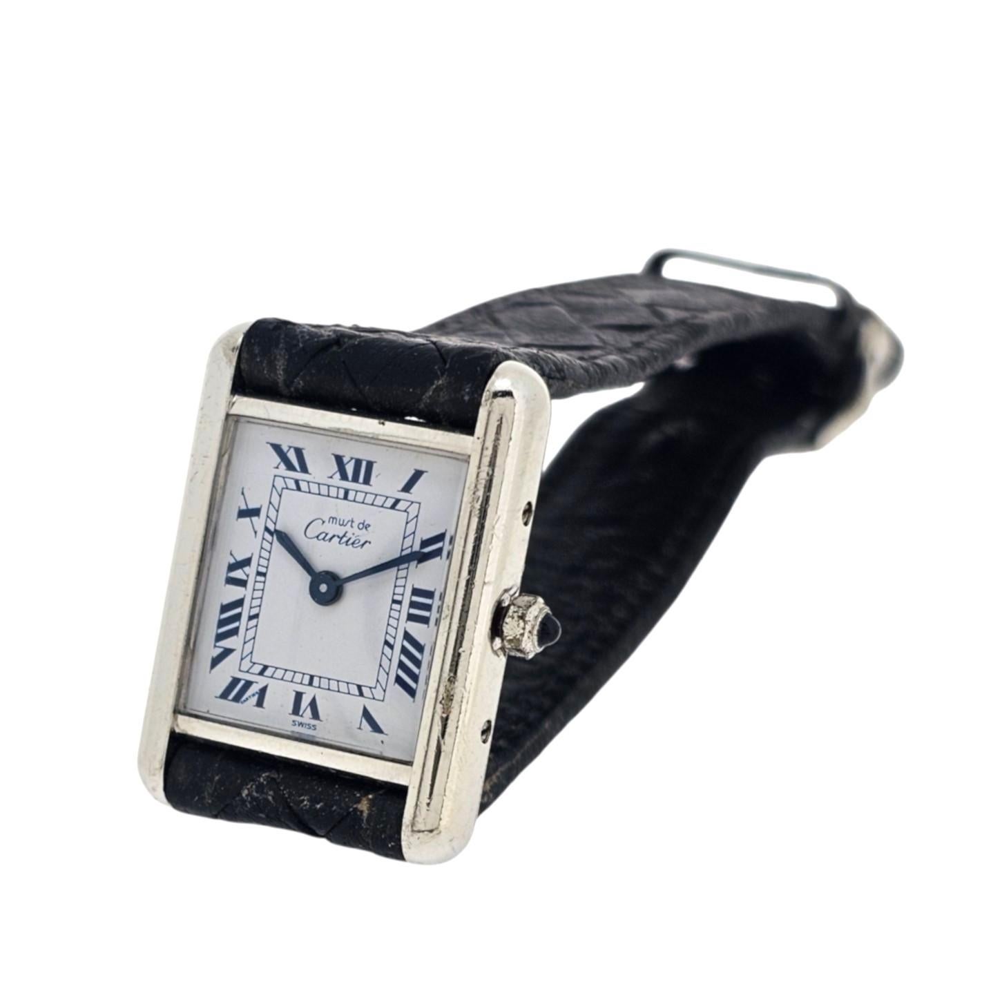 Introduction:

This Cartier Must Sterling Silver Tank Watch comes with White Dial Blue Roman Numerals; Quartz Movement Small size 21mm X 28mm  Women Size.

Condition:
Silver parts have been cleaned but had not been polished.  It has visible signs of