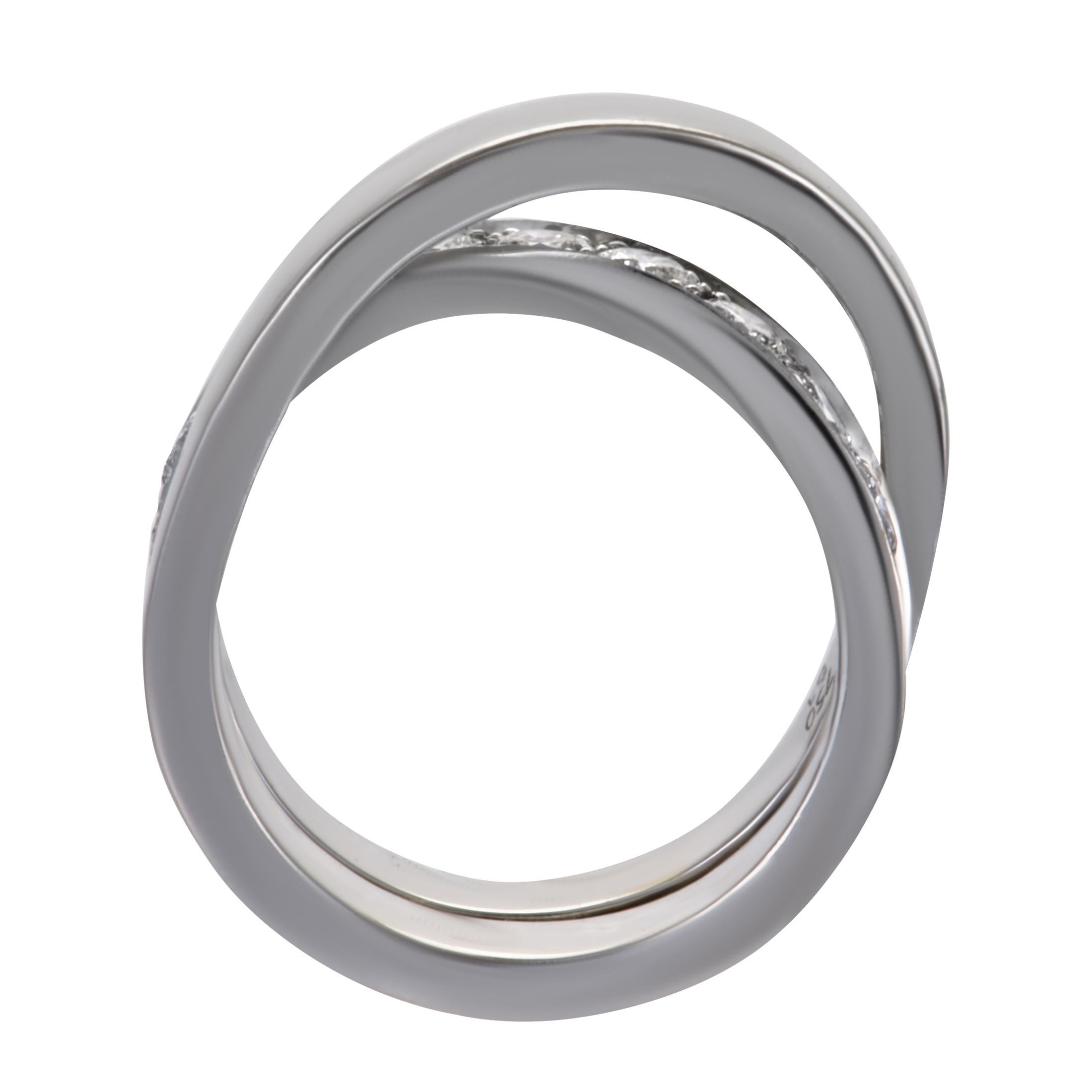Showcasing their expertise in designing exceptionally elegant shapes, bringing them to life in sublime fashion and adorning them in a tastefully subtle manner, Cartier created this fantastic 18K white gold ring which is exquisitely set with