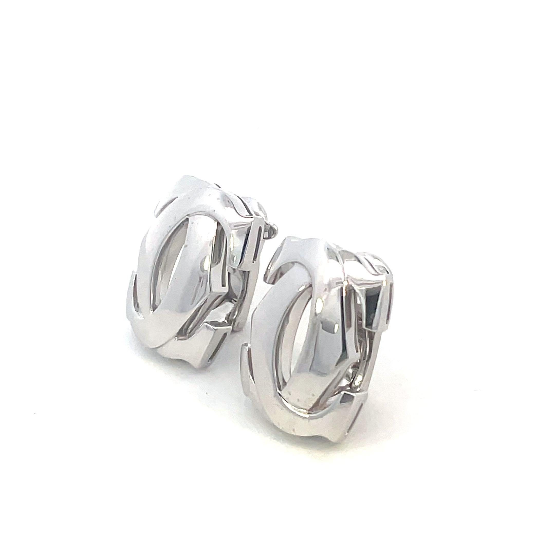 Cartier 18K White Gold Penelope Double C earrings weighing 18 grams. Excellent pre-owned condition. Signed and numbered, french marks.
100% Original guaranteed