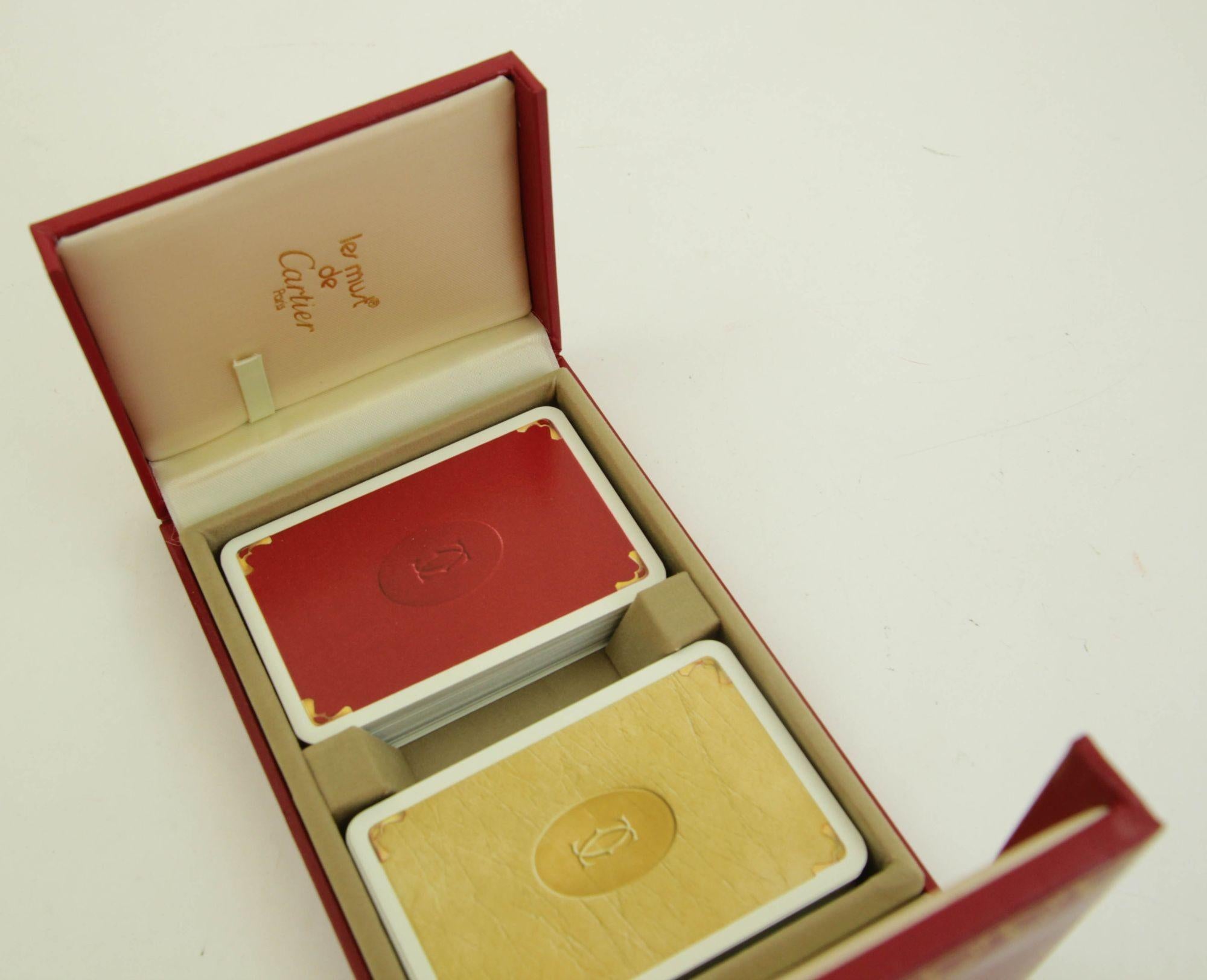Must De Cartier Paris Vintage Playing Poker or Bridge Cards in Red Original Box.
Cartier playing cards, one deck plus joker, poker, bridge playing cards in Cartier red 2-doors case.
Les Must De Cartier playing cards were only sold from