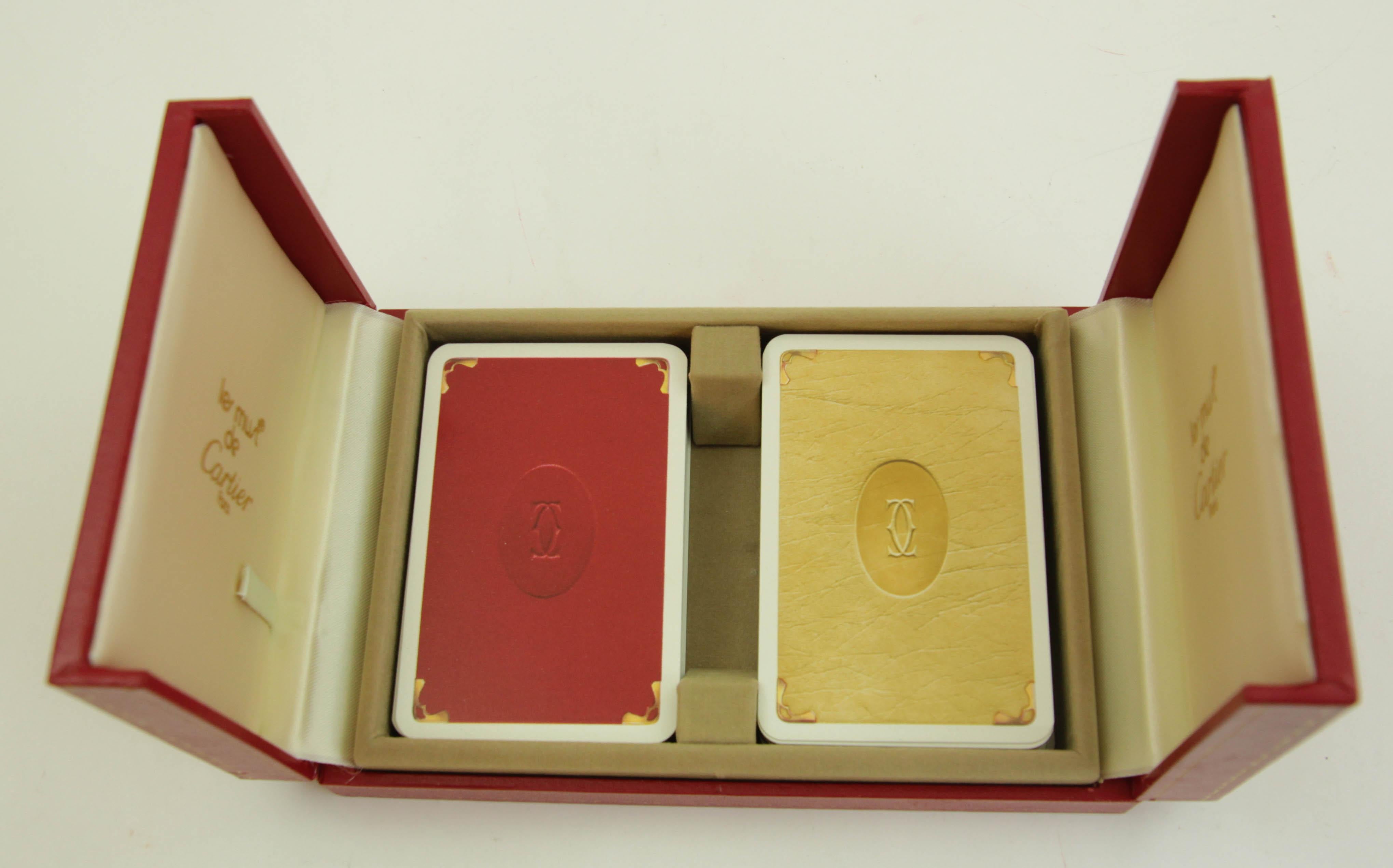 Must De Cartier Paris Vintage Playing Poker or Bridge Cards in Red Original Box.
Cartier playing cards, one deck plus joker, poker, bridge playing cards in Cartier red 2-doors case.
Les Must De Cartier playing cards were only sold from