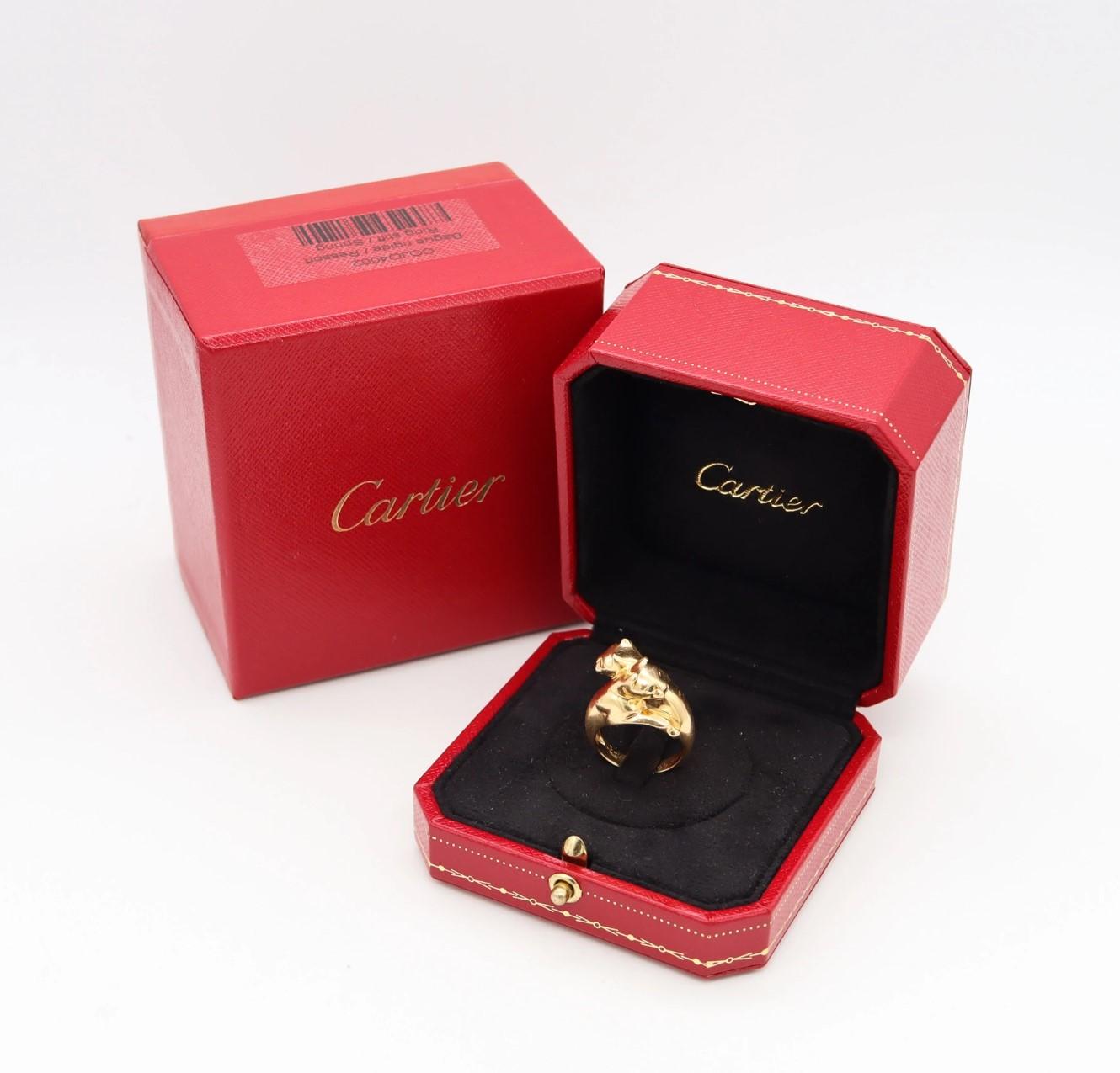 Double pantheres ring designed by Cartier.

Beautiful iconic piece, created in Paris France by the jewelry house of Cartier. This rare double pantheres ring has been crafted in solid yellow gold of 18 karats, with high polished finish. The eyes of