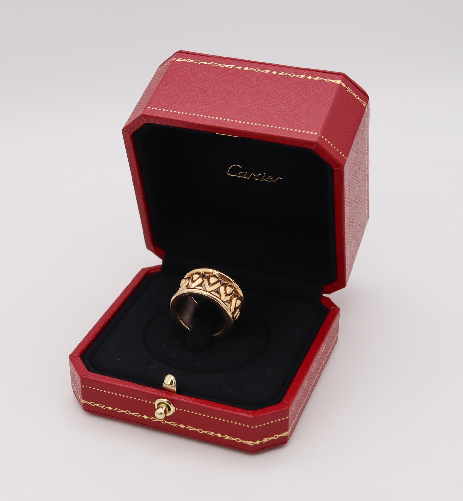 A Tanjore band designed by Cartier.

Beautiful piece, created in Paris France, by the jewelry house of Cartier. This rare ring band has been crafted in solid yellow gold of 18 karats, with a band in white gold creating a great contrast

Has a total