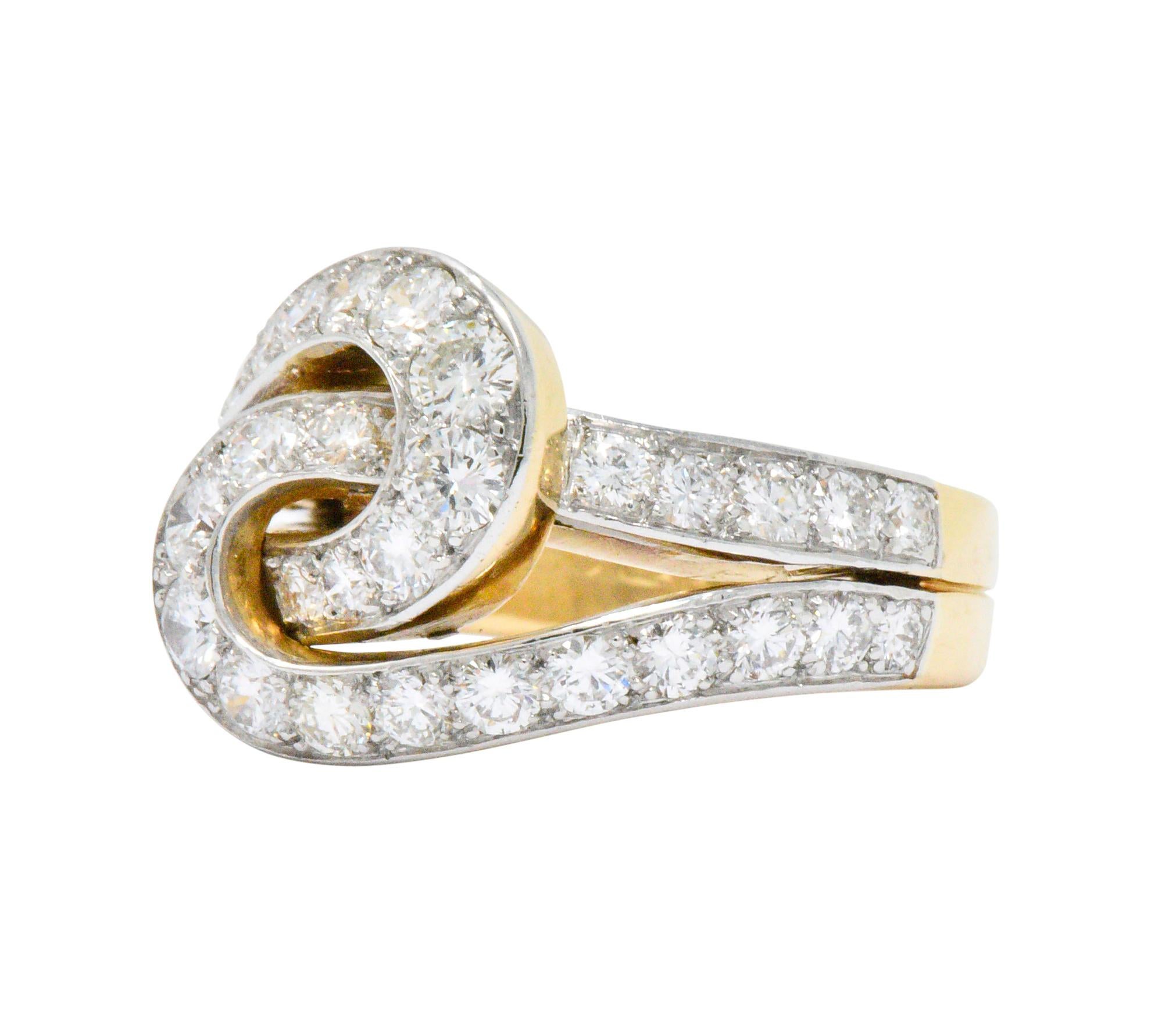 Featuring interlocking loops, set with round brilliant cut diamonds, weighing approximately 3.00 carat total, G/H color and VS clarity

Fantastic cocktail ring with presence

Fully signed Cartier and numbered (worn)

Engraved 