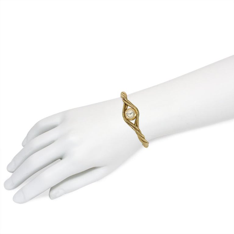 Cartier, Paris Retro Gold Bracelet Watch with Twisted Snake Chain Strap