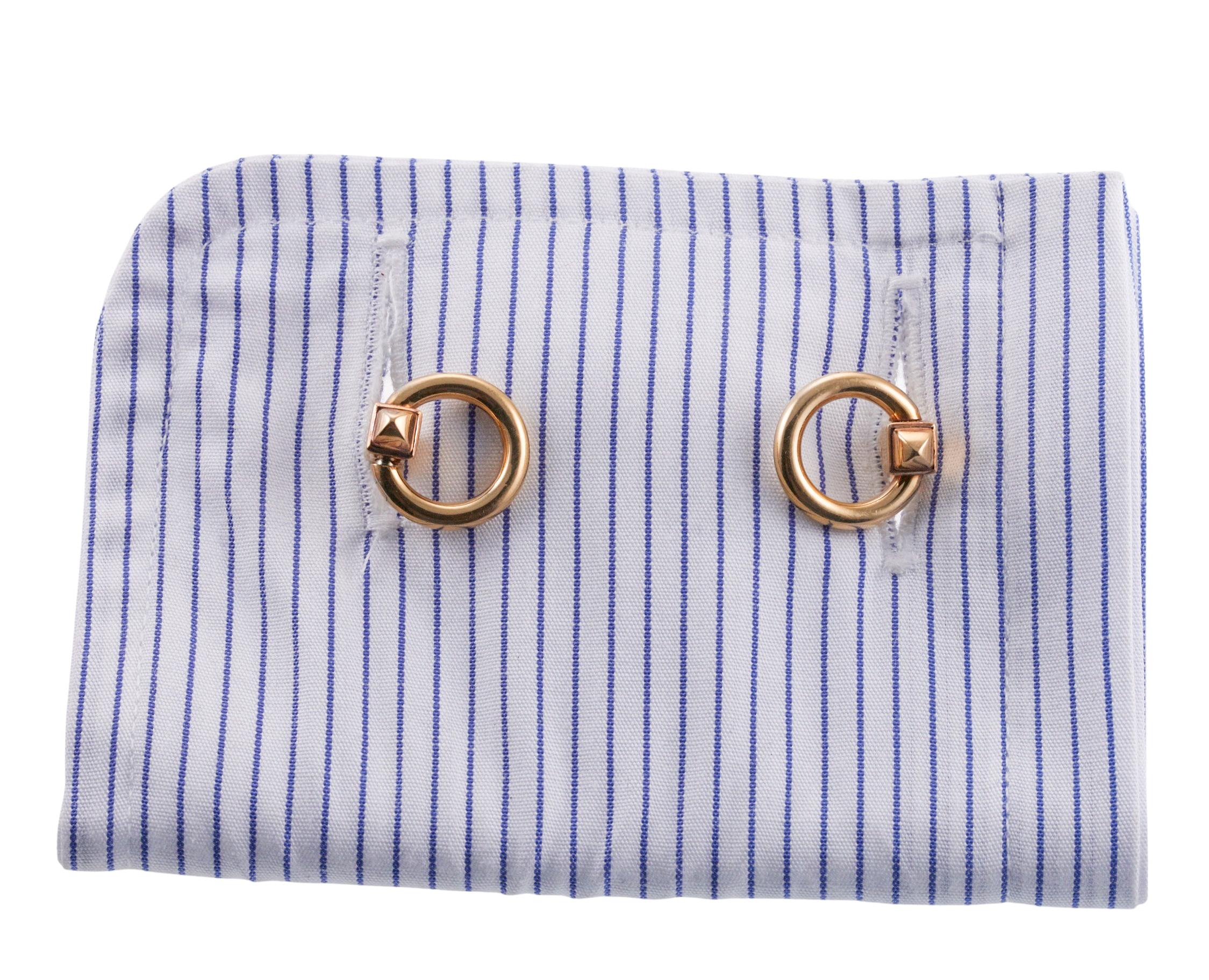 Pair of 18k gold Cartier Paris Retro cufflinks, each top measures 15mm in diameter. Set comes in original Cartier box - damage consistent with age. Cufflinks are hallmarked with Eagle head French mark, Cartier Paris. Weight - 12.4 grams.