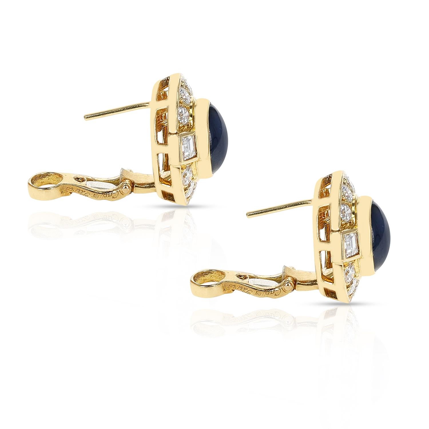 A pair of Cartier Paris Sapphire Cabochon and Diamond Earrings made in 18K Yellow Gold. The length is 0.75 inches. The total weight is 11.30 grams.