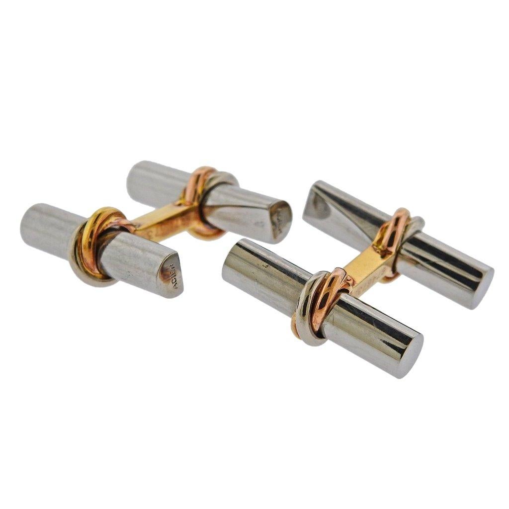 Paire de boutons de manchette Trinity en or 18k et acier par Cartier Paris. Le bouton de manchette mesure 22mm x 8mm. Le poids est de 9,6 grammes. Marqué Cartier, Acier, 750, 674673, marques françaises.