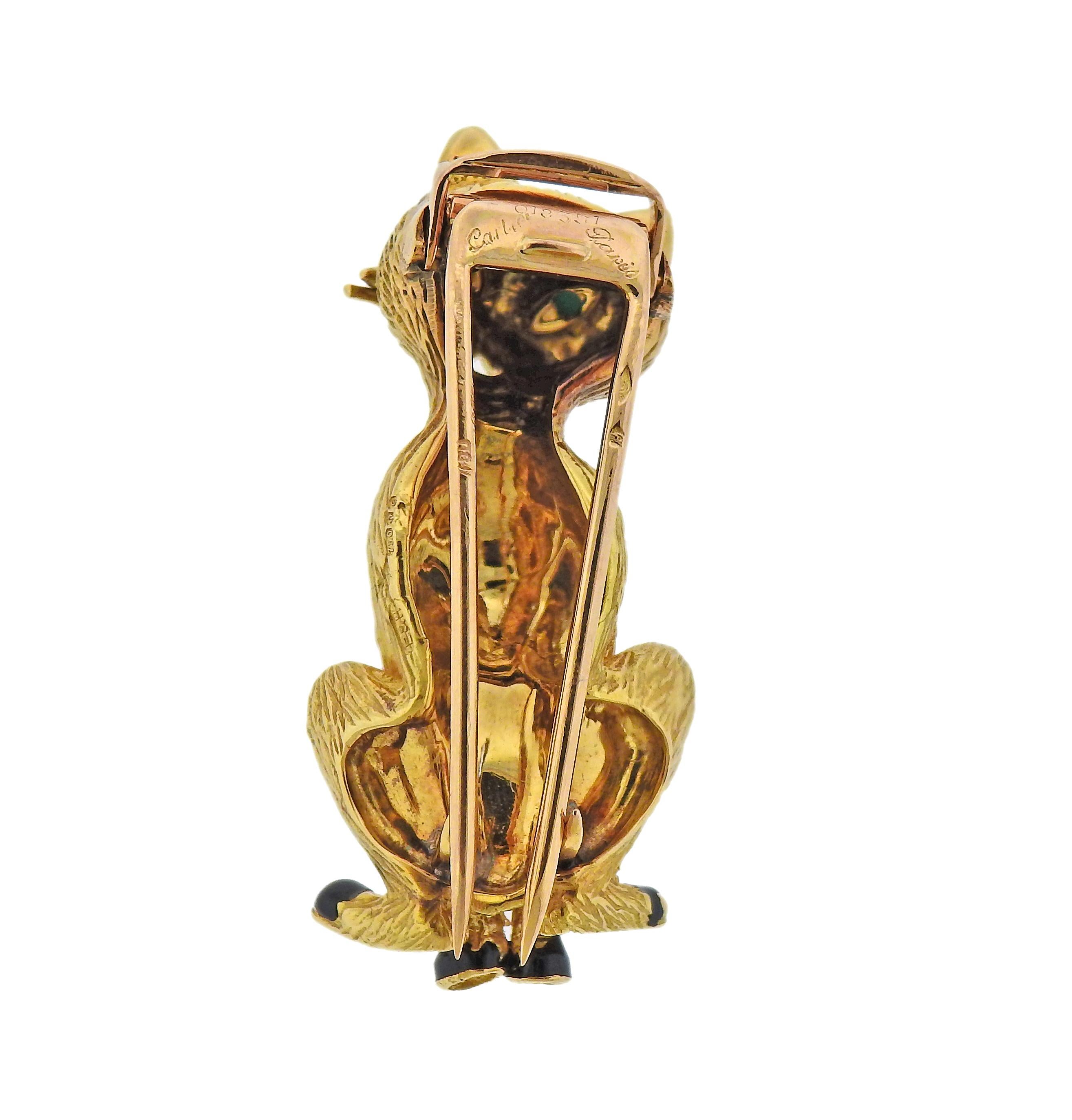 Cartier Paris 18k gold cat brooch, set with black enamel and turquoise eyes. Cat is 40mm x 20mm. Minor chips on enamel are presetn. Marked: Cartier Paris, 018 331, French marks. Weight - 17.9 grams. 