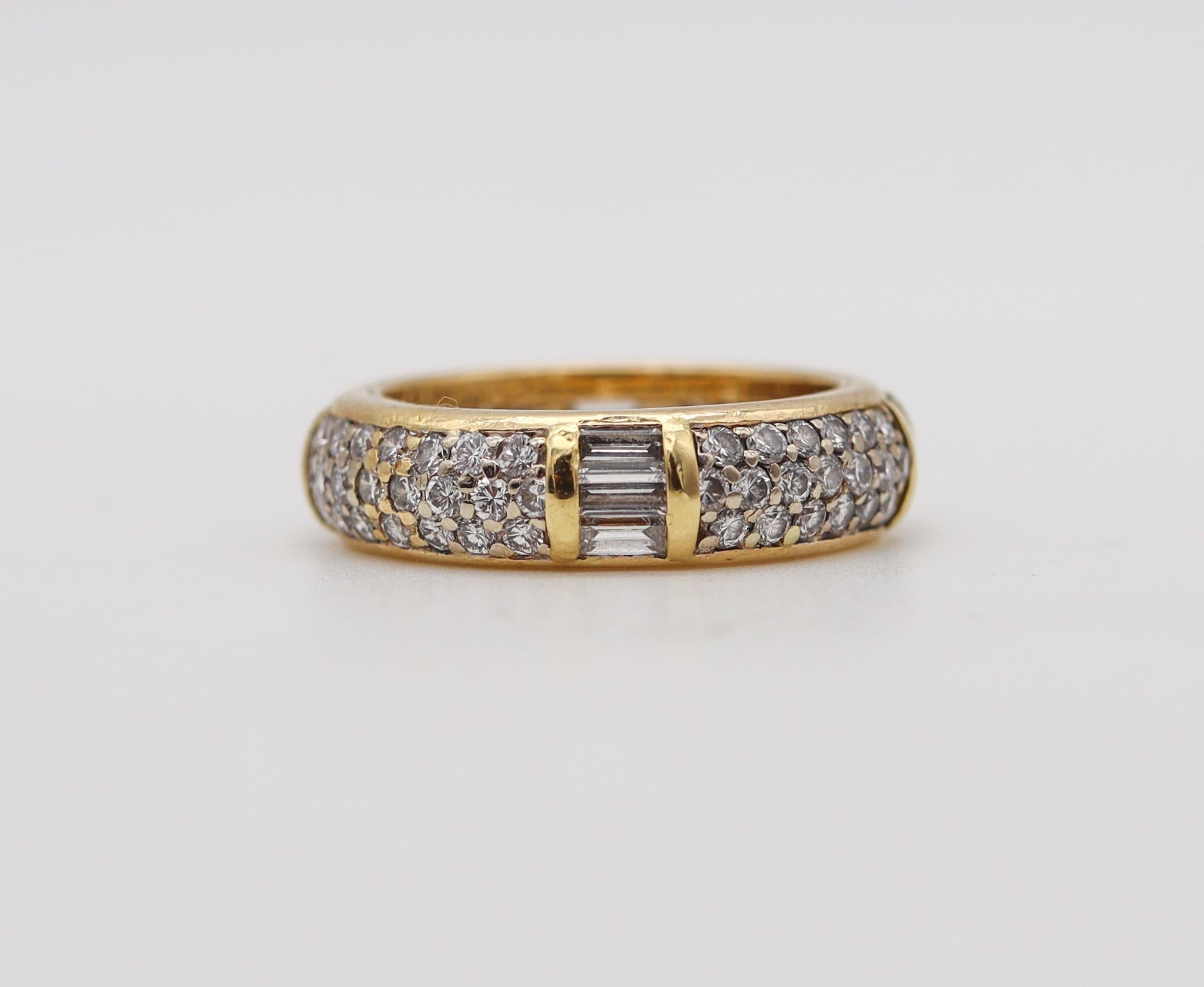 An unusual eternity ring designed by Cartier.

Very rare and unusual eternity ring, created in Paris France by the jewelry house of Cartier, back in the 1980. This ring has been crafted with a bold look, with four stations in solid yellow gold of 18