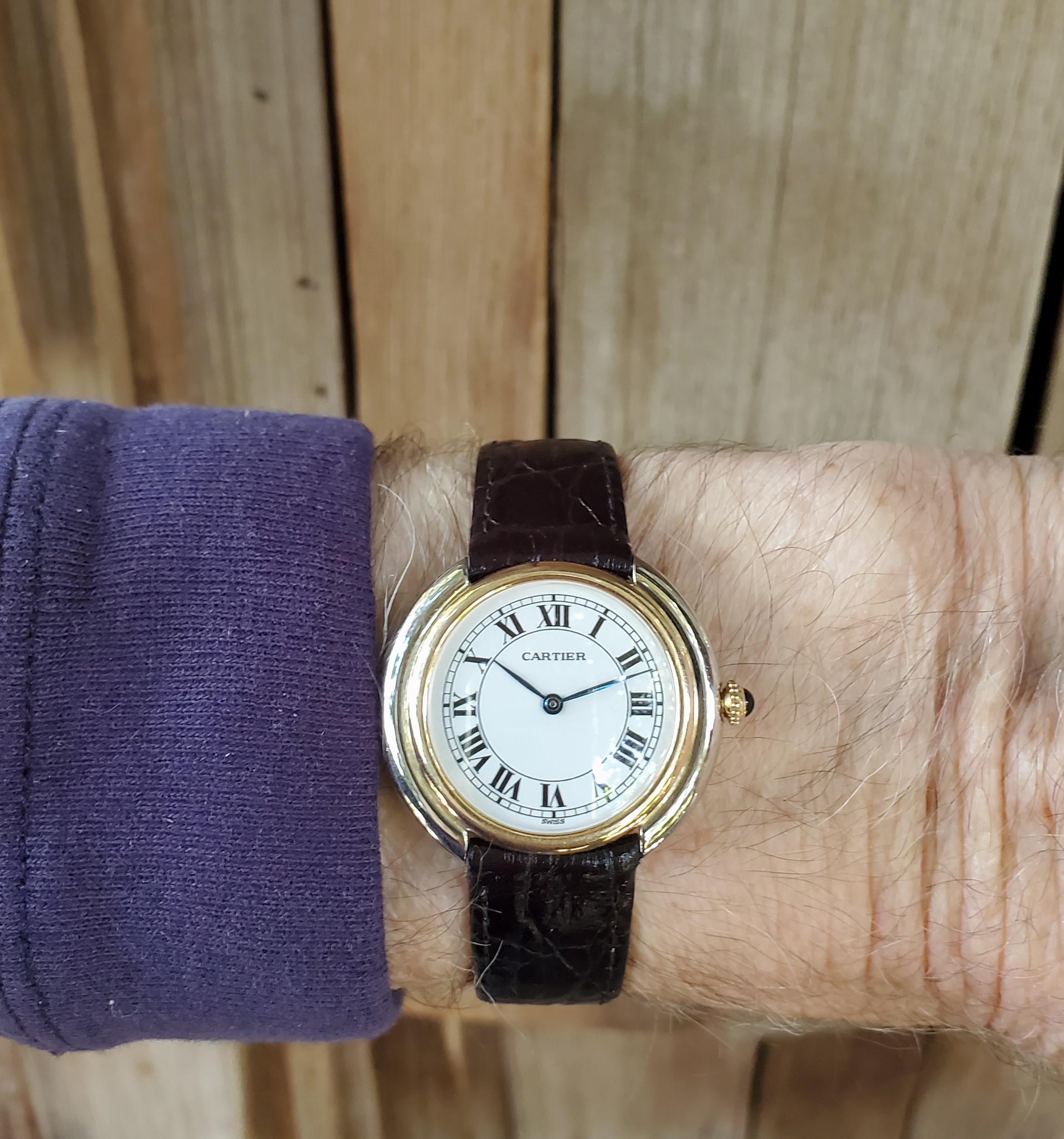 Introduction:
This Vintage Cartier Paris Vendome watch is the extra large size, and measures 34mm;  circa 1973-1976.  The watch is made in 18 Karat yellow and white gold.  The watch is fitted  with an 17-jewel manual wind movement.  The watch has a