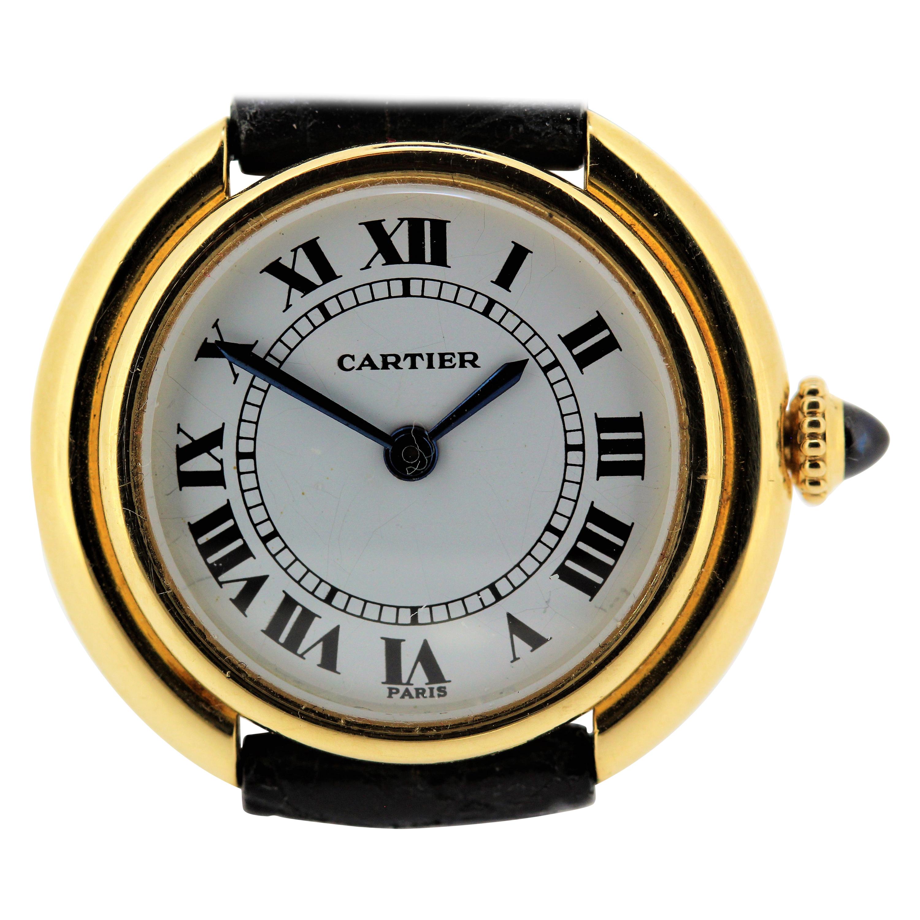 Introduction:
This Vintage Cartier Paris Vendome watch is the large size, circa 1975-1980.  The watch is made in 18 Karat yellow gold and measures 33 mm with an automatic movement.  The watch has a Cartier black Lizard strap and 18K Cartier vintage