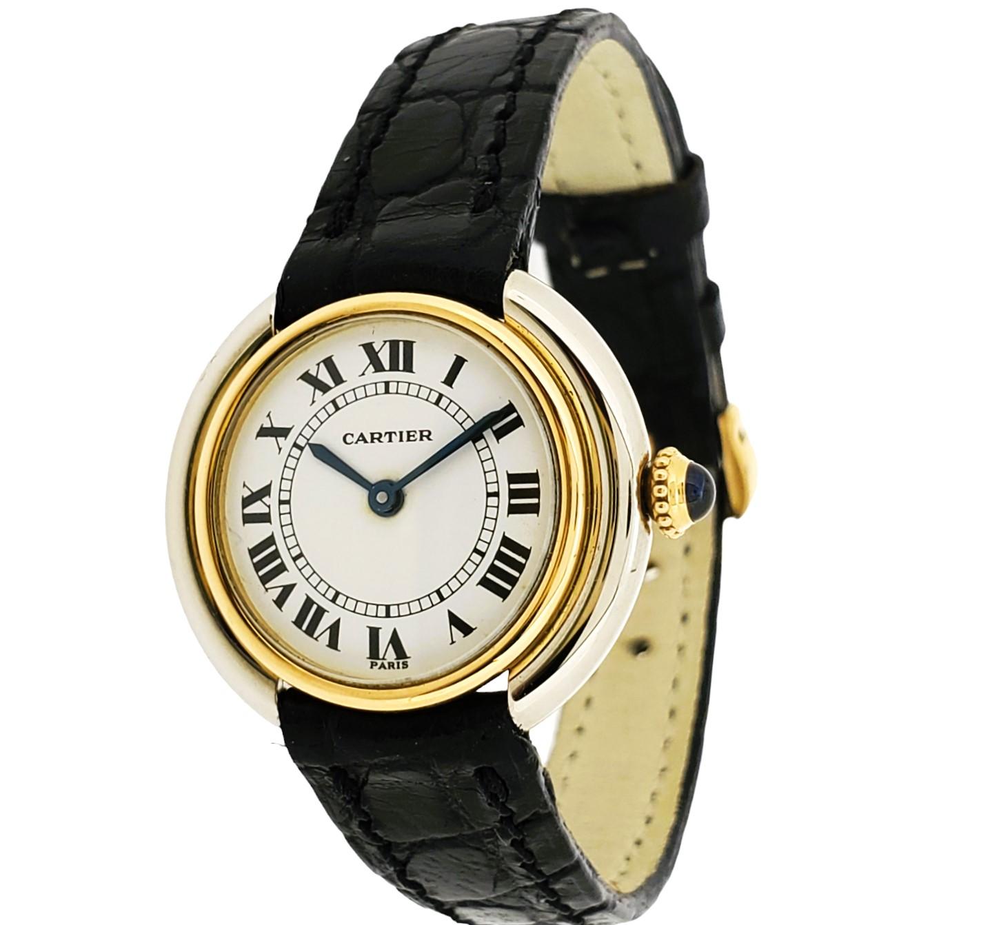 Introduction:
Cartier Paris Vintage Vendome pm watch; made in 18K white and yellow gold (2-tone). This is the pm (small size), circa 1973-1976. The watch measures 26mm in diameter. The watch is fitted with a 17-jewel manual wind movement, white