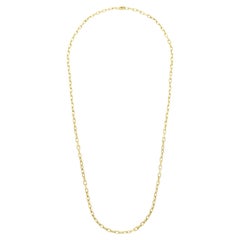 Cartier Paris, collier long Santos de Cartier vintage en or jaune 18 carats