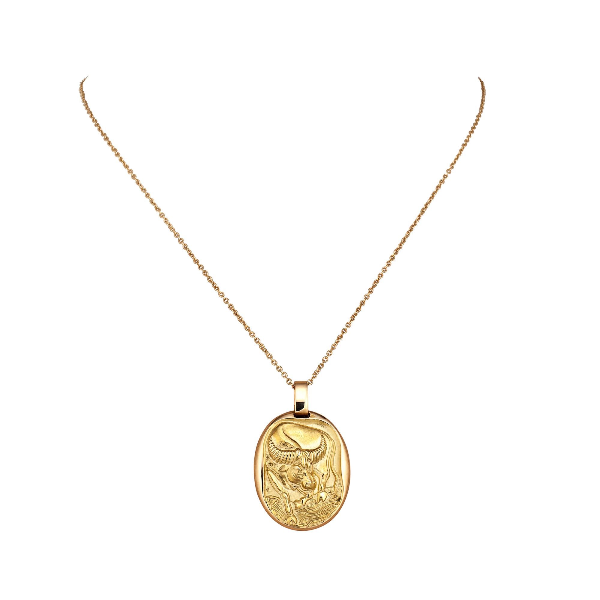 This Cartier Paris vintage Taurus zodiac gold pendant charm celebrates those born between April 19th and May 20th.  With the bull as the Taurus symbol sculpted on the front, this pendant charm represents that animal's stability, endurance, and