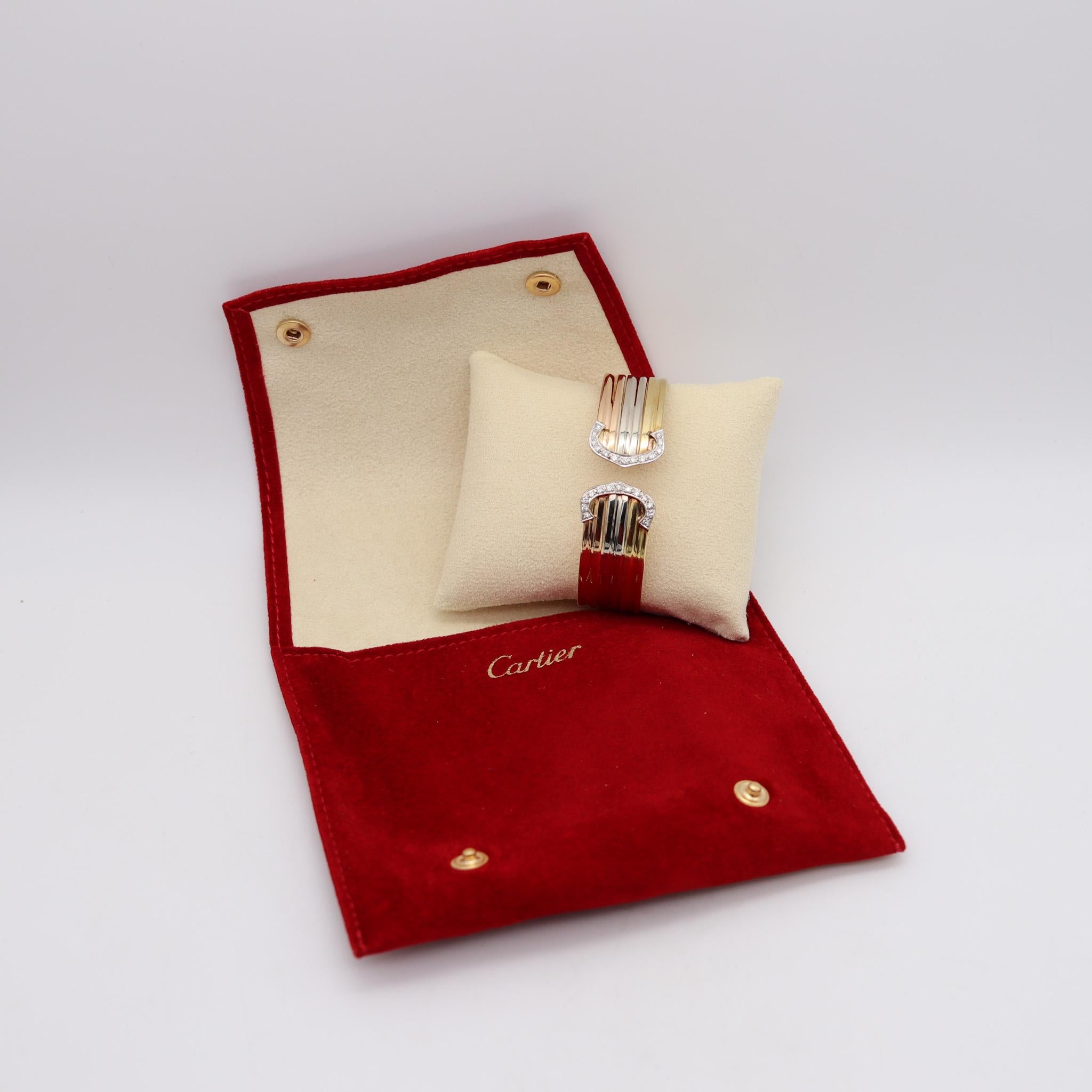 Modernist Cartier Paris Vintage Trinity Double C Cuff Bracelet In 18Kt Gold With Diamonds For Sale
