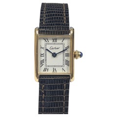 Cartier Paris Montre-bracelet classique Tank mécanique en or jaune vintage pour femme