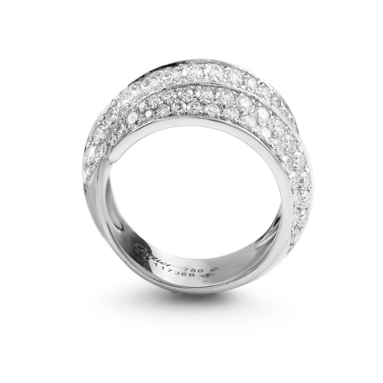The shimmering, smooth body of this ring from Cartier cannot be ignored. Forged from the finest 18K white gold and set with a partial pave of 1.60 carats of diamonds, this ring is a real gem.

Included Items: Manufacturer's Box
Ring Size: 6.5 (52