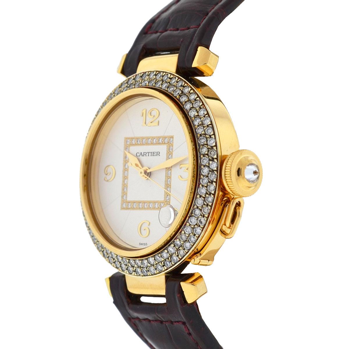 Company-Cartier
Model-Pasha
Case Metal-18k Yellow Gold
Case Size-Factory Dial White 
Dial-36mm
Bezel-Aftermarket 18k Yellow Gold / Diamond 
Bracelet-Maroon Leather, Shows cracks and wear on the band (check pics) Fits Wrist 7 1/2
Crystal-Scratch