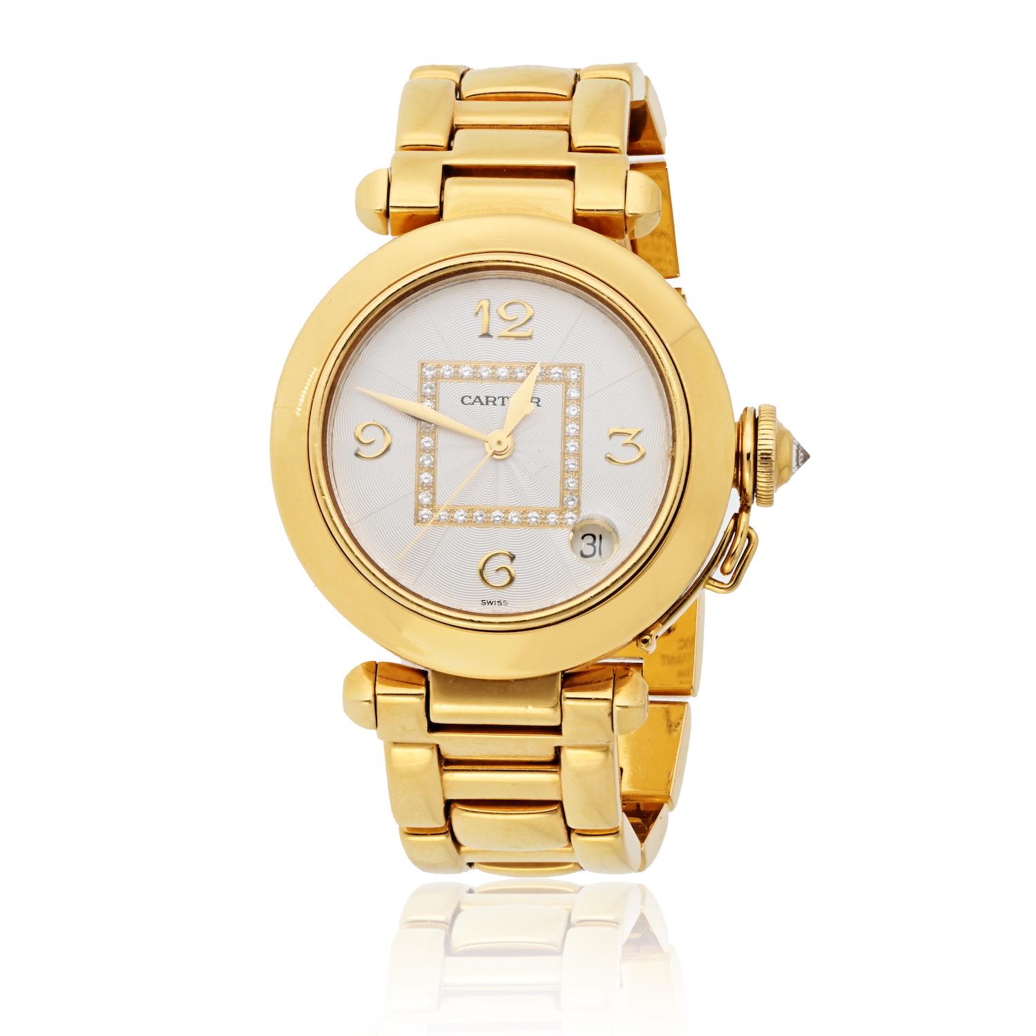 Cartier Pasha 18K Yellow Gold 35mm Automatic Factory Dial Watch  

This classic Cartier Pasha features an automatic self-winding movement, combining luxury with precision. Designed for versatility, it is water-resistant up to 100 meters, making it