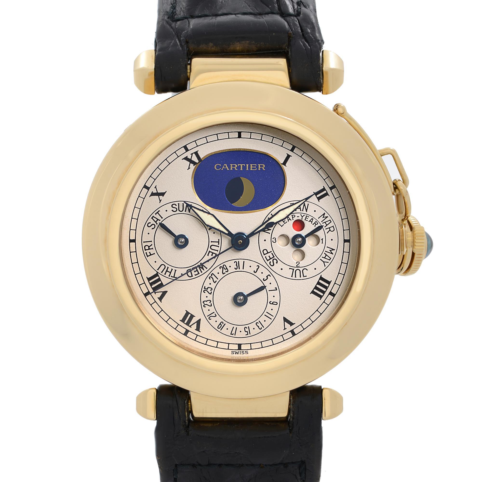 Pre-owned Cartier Pasha 18K Yellow Gold Moonphase Perpetual Calendar Quartz Watch 30003. Minor Scratches on the Case Back, Minor Blemishes on the Black Leather Strap, Some Dirt on the Hands on Closer Inspection. This Beautiful Timepiece is Powered