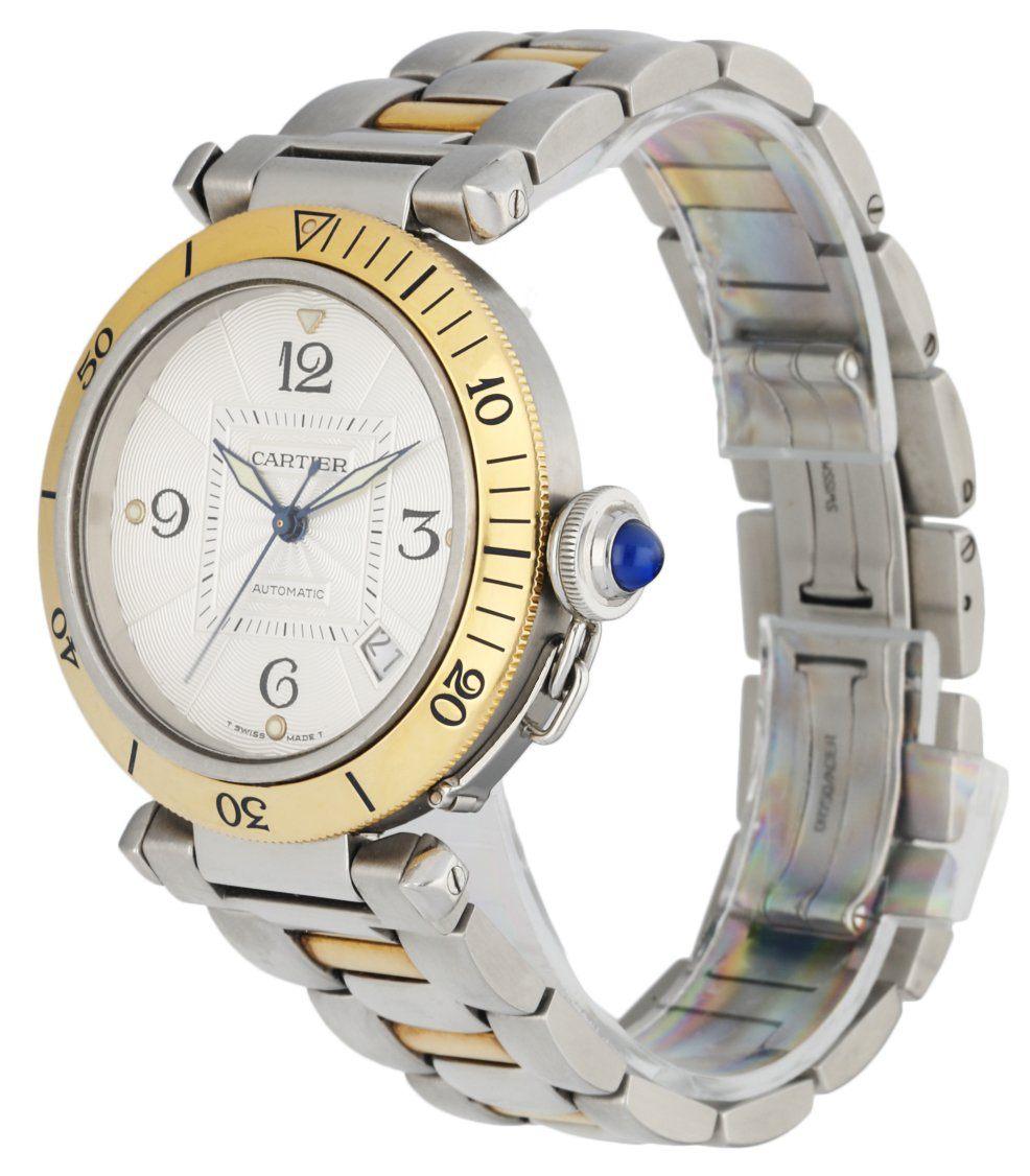 Cartier Pasha 2378 men's watch. 38MM stainless steel case with 18K yellow gold unidirectional bezel. Silver dial with blue luminous hands and Arabic numeral & index hour marker. Date display between 4 & 5 o'clock position. Stainless steel & 18K
