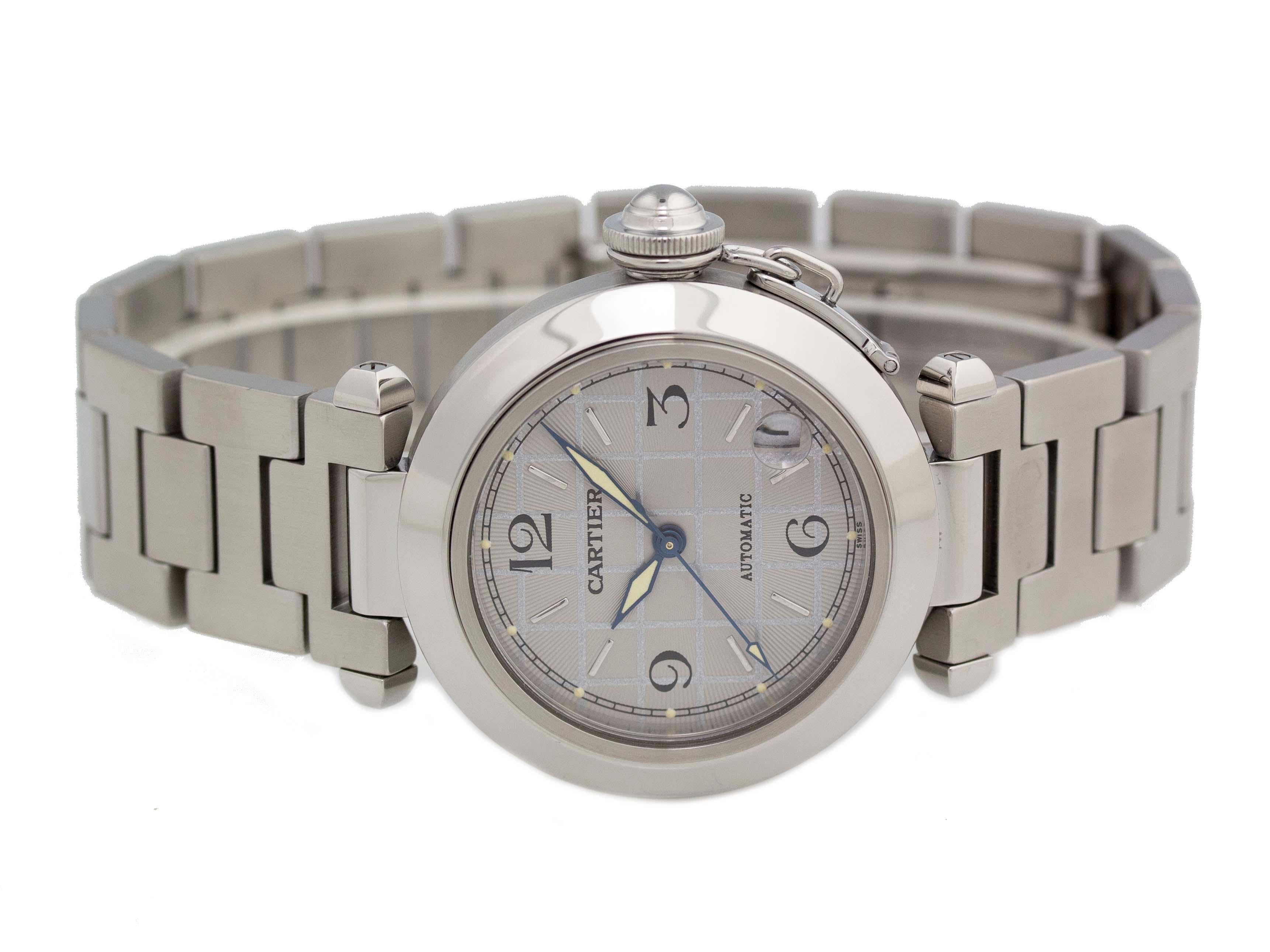 Brand	Cartier
Series	Pasha
Model	W31023M7
Gender	Unisex
Condition	Good Pre-owned, Tiny Dings & Scratches on Bezel, Case, & Bracelet
Material	Stainless Steel
Finish	Brushed & Polished
Caseback	Stainless Steel
Diameter	35mm
Thickness	10mm
Bezel	Fixed