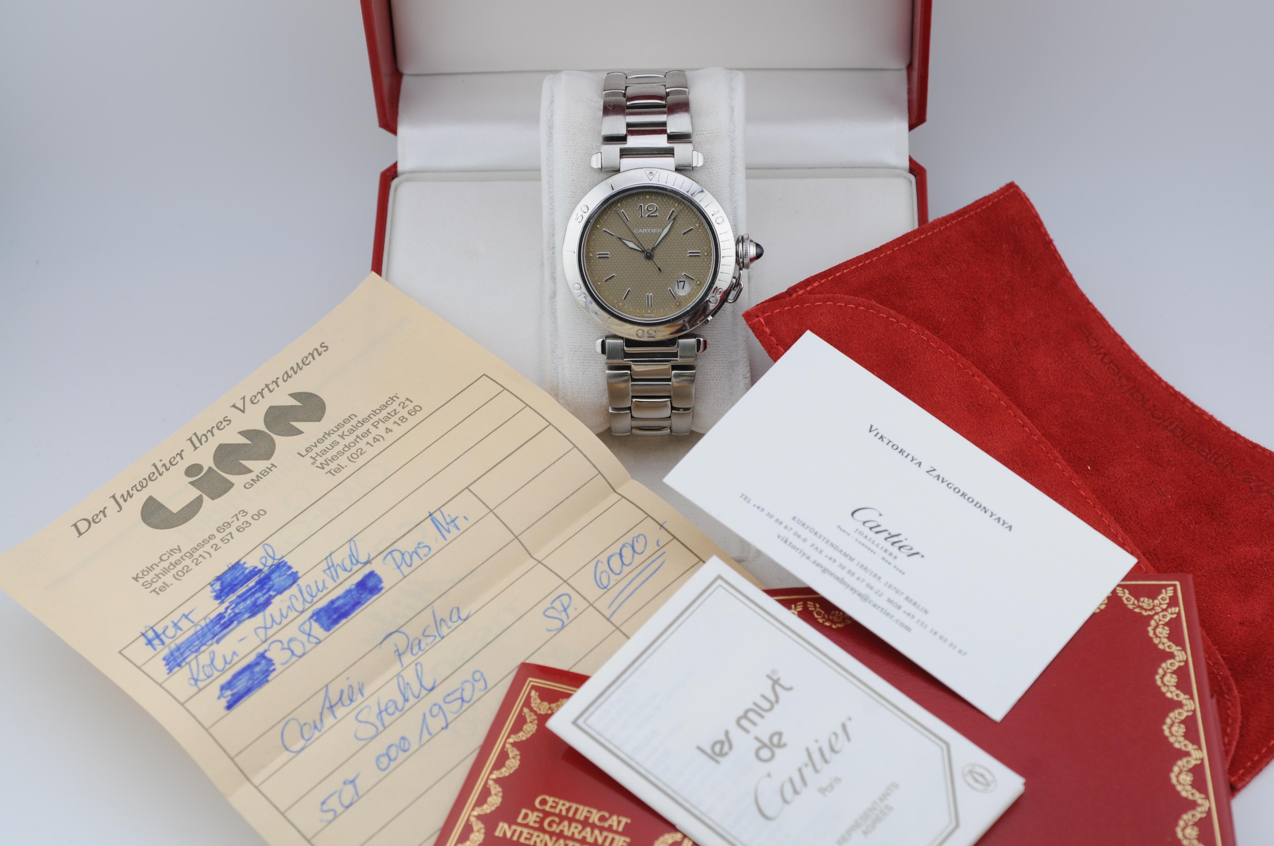 The Cartier Pasha 38mm Ref. 1040 from 1996 is a distinguished automatic timepiece with a timeless round design. This full-set watch features a unique brown-beige dial, adding to its elegance and charm. The last service was completed in 2019,