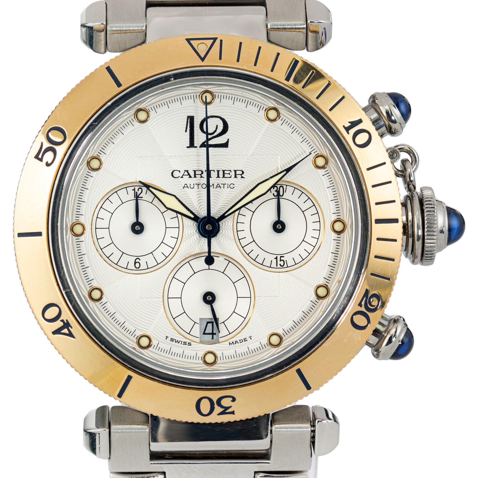 If you're on the hunt for a timepiece that exudes elegance and sophistication, this Cartier 18k yellow gold and steel pasha chronograph ladies wristwatch is a must-see. Crafted with a blend of 18k yellow gold and steel, this watch strikes the