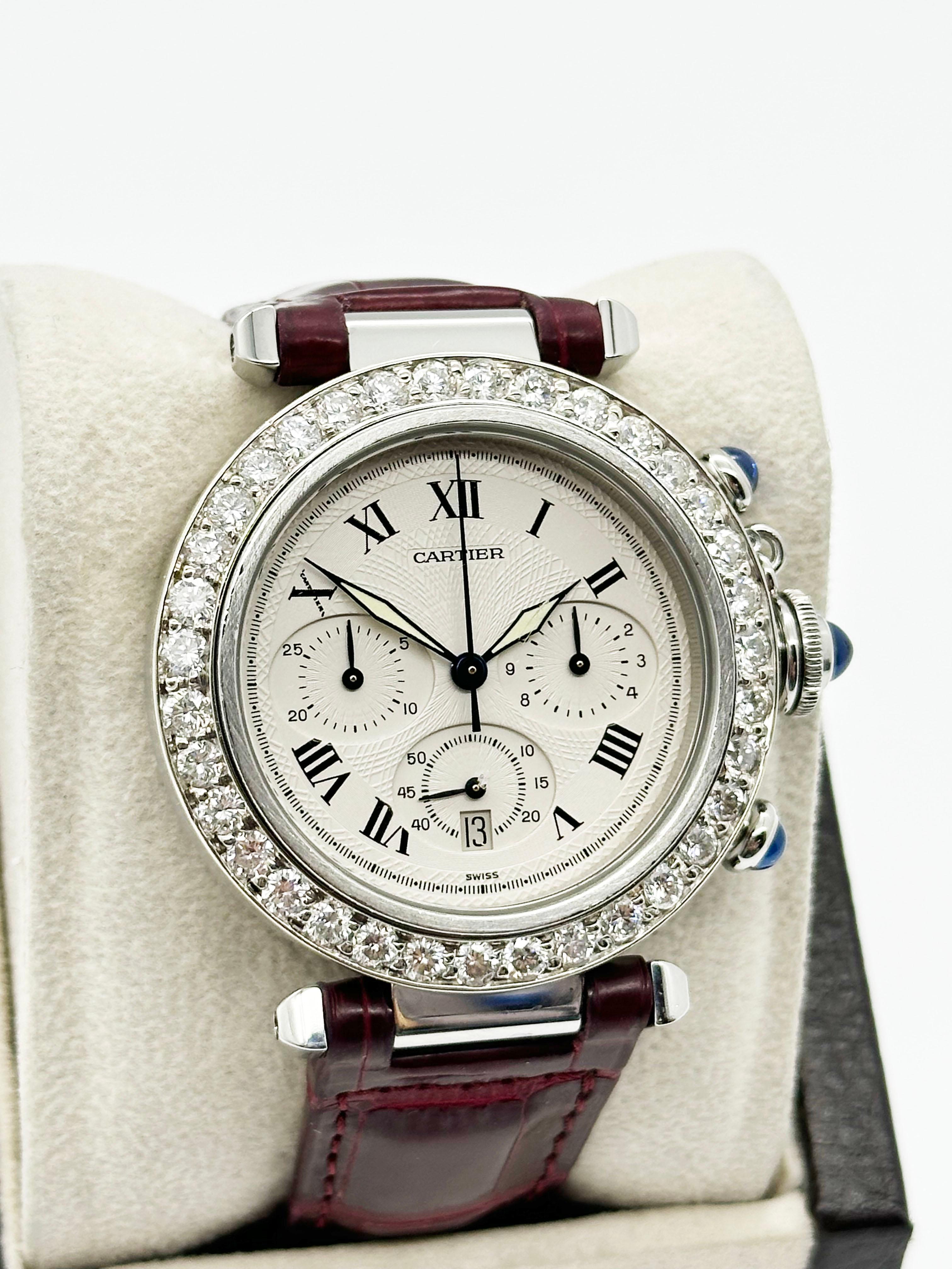 Style Number: 1050
Model: Pasha Chronograph
Case Material: Stainless Steel 
Band: Leather Band
Bezel:  Custom Diamond Bezel 
Dial: Silver Guilloche
Face: Sapphire Crystal 
Case Size: 38mm 
Includes: 
-Elegant Watch Box
-Certified Appraisal 
-1 Year