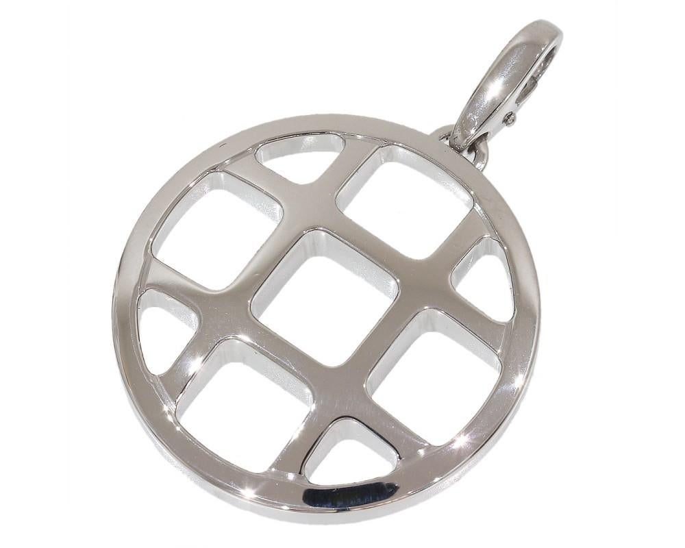 Beautiful Authentic Cartier 18k Solid white gold pendant for a necklace. 
A classic and classy look from one of the premier names in fine jewelry.
The pendant features a circular motif with the iconic square grid design, it is in excellent condition