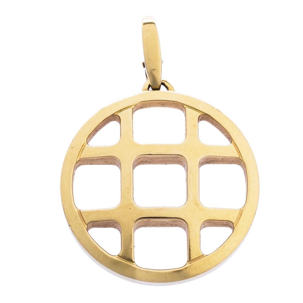 Don luxury with this pendant from Cartier's Pasha de Cartier collection. It is made from 18K yellow gold and sculpted in a circular shape with a cage-like design. A smooth bail completes the creation. Suspend it from a matching chain and wear it