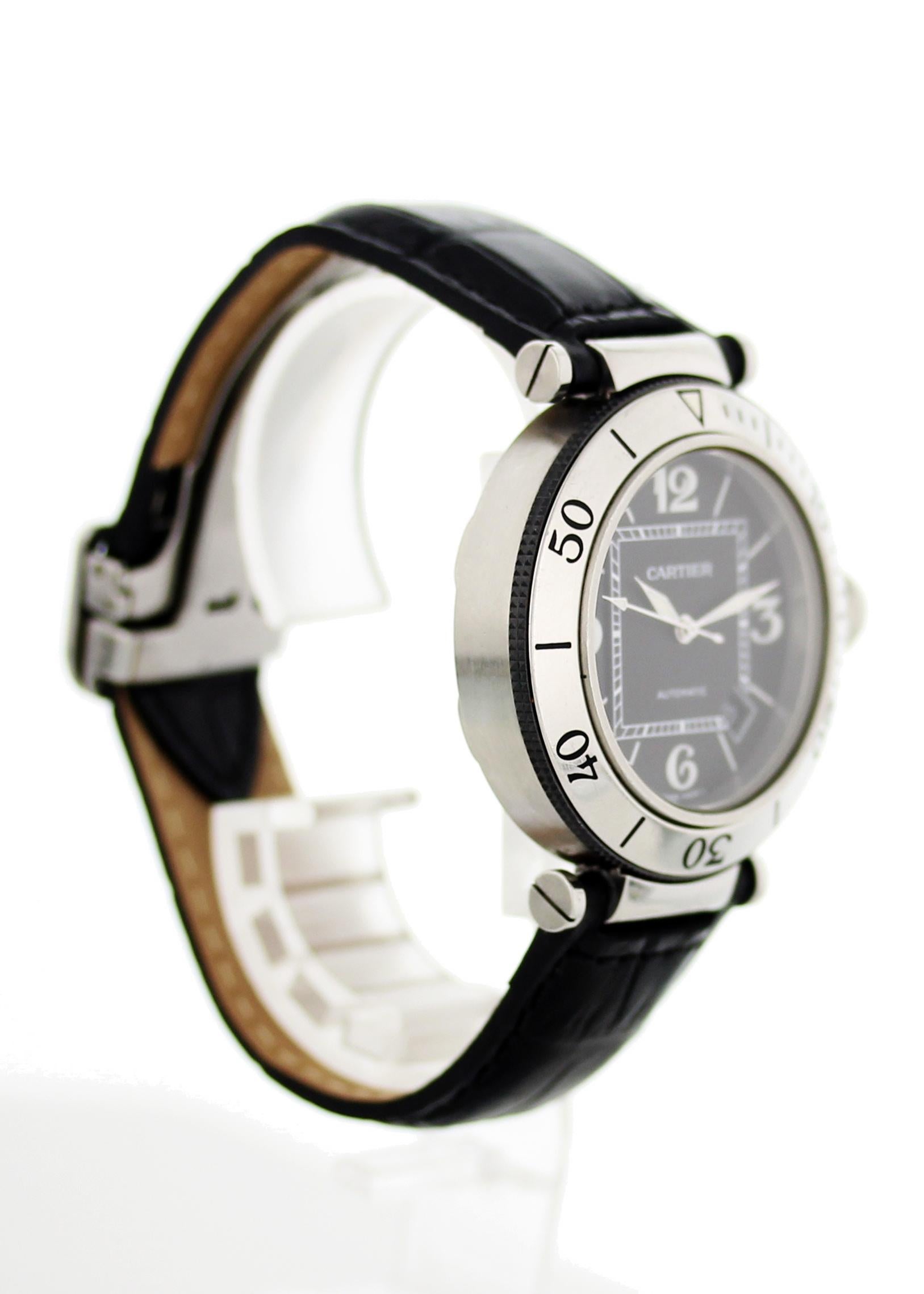 Pasha de Cartier 2790. Stainless steel 40mm case. Stainless steel unidirectional bezel. Black dial with steel, luminous hands and white numerals. Date display at 4:30 o'clock. Black, leather strap with original buckle will fit up to a 6-inch wrist.