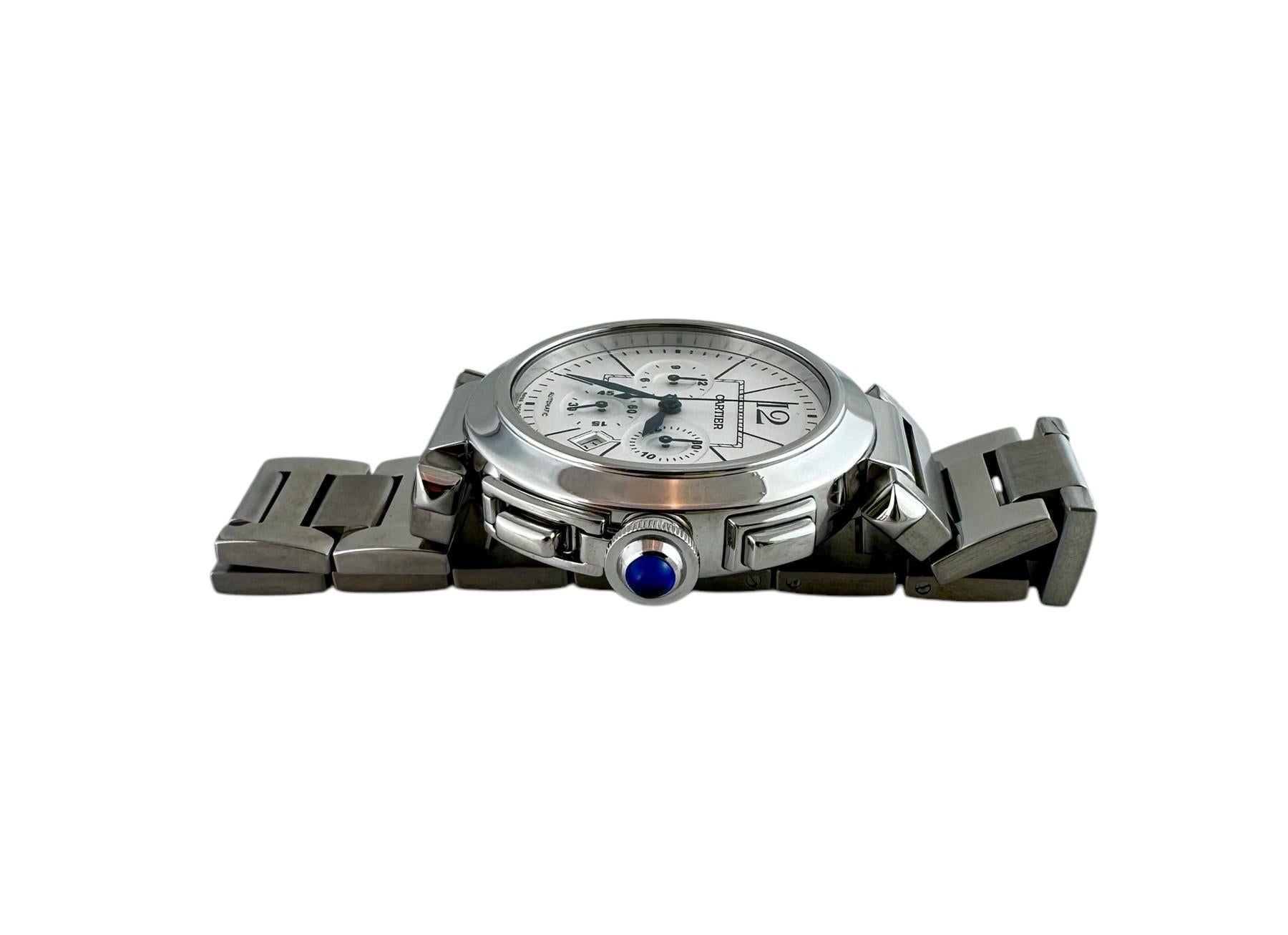 Cartier Pasha de Cartier Men's Watch

Model: 2860
Serial: 21401NX

This men's Cartier Pasha watch is set in stainless steel

Case is 42mm

White dial, black markers, sapphire hands

Chronograph dial

Date

Automatic movement

Cabochon sapphire