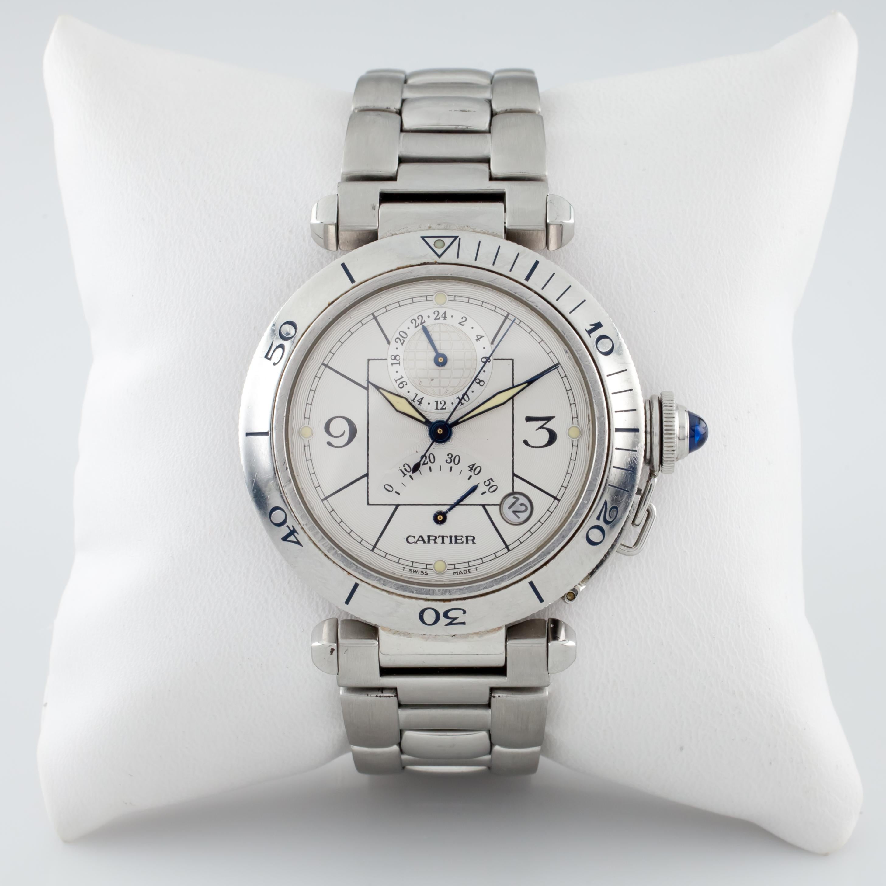 Cartier Pasha Men's Stainless Steel Automatic GMT Watch w/ Power Reserve 2388

Model: Pasha GMT
Model #2388
Stainless Steel Watch w/ Articulating Bezel

Includes Detachable Crown w/ Sapphire Cabochon
38 mm in Diameter (45 mm w/ Crown)
Lug-to-Lug