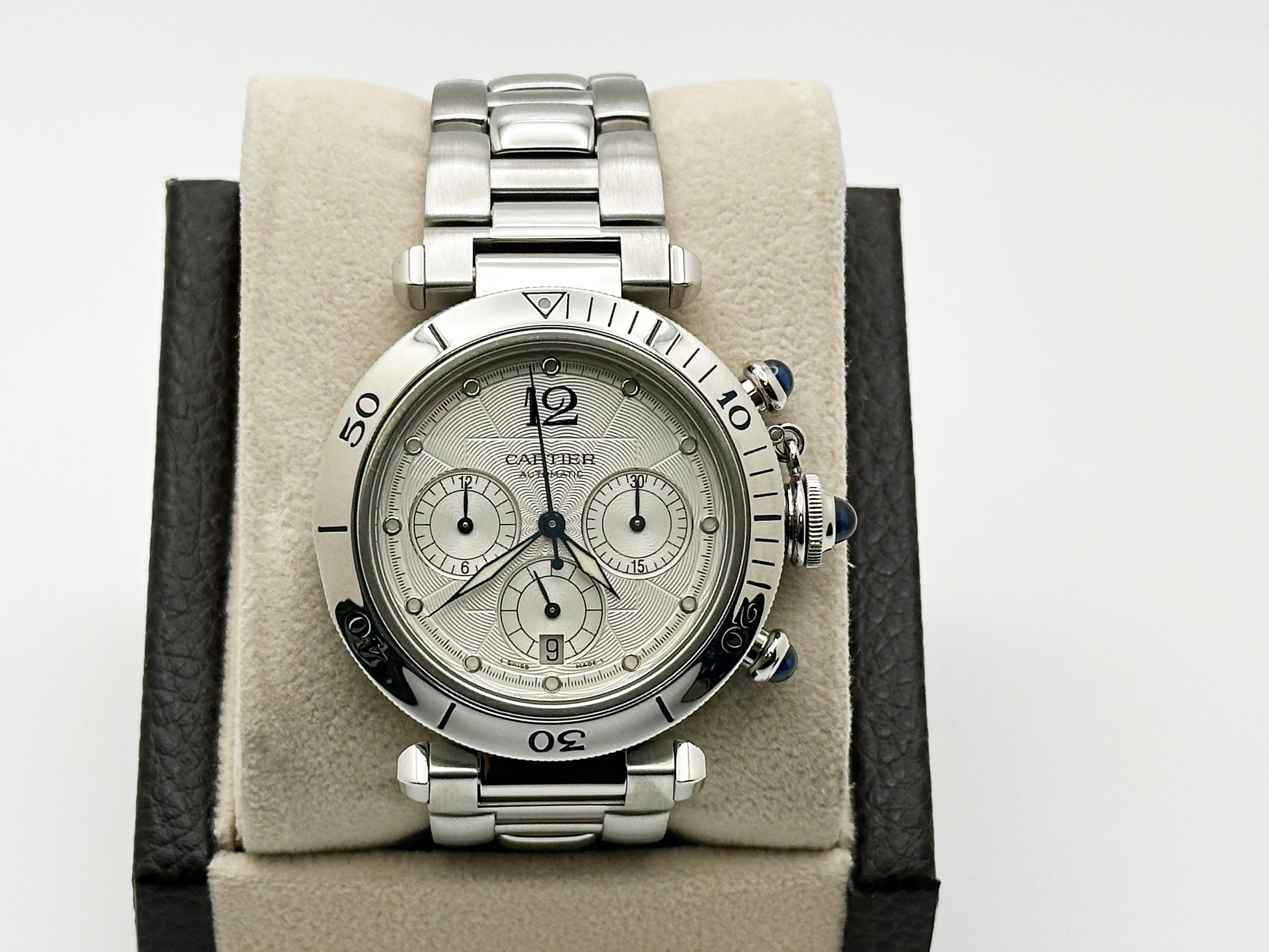 Style Number: 2113 

 

Model: Cartier Pasha 

 

Case Material: Stainless Steel 

 

Band: Stainless Steel 

 

Bezel: Stainless Steel 

 

Dial: Silver

 

Face: Sapphire Crystal 

 

Case Size: 38mm 

 

Includes: 

-Elegant Watch Box