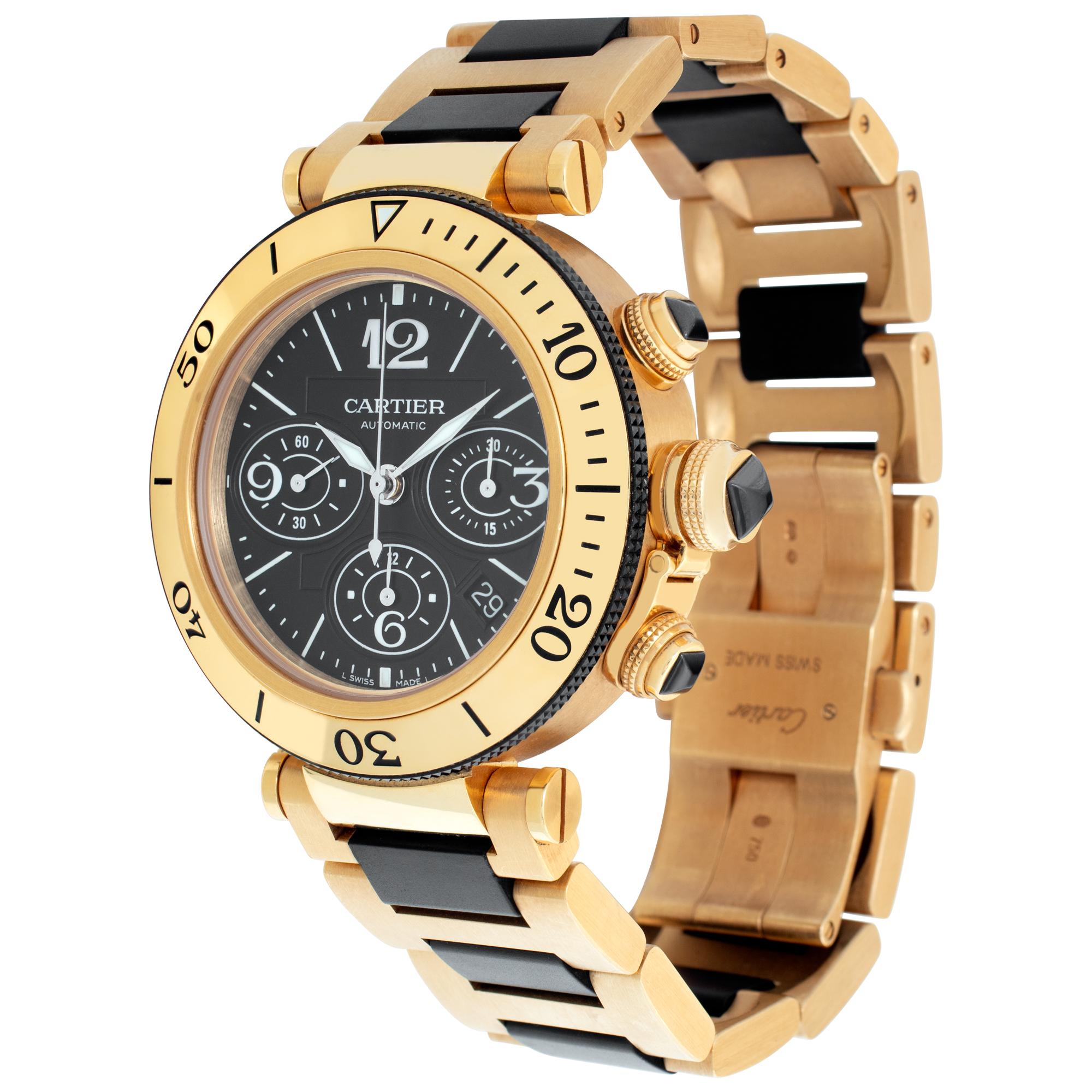 Cartier Pasha Seatimer Chrono in 18k yellow gold case on an 18k link band with rubber center with unidirectional rotating bezel with black ceramic edge. Auto w/ subseconds, date and chronograph. 42 mm case size. Ref W301970M. Fine Pre-owned Cartier