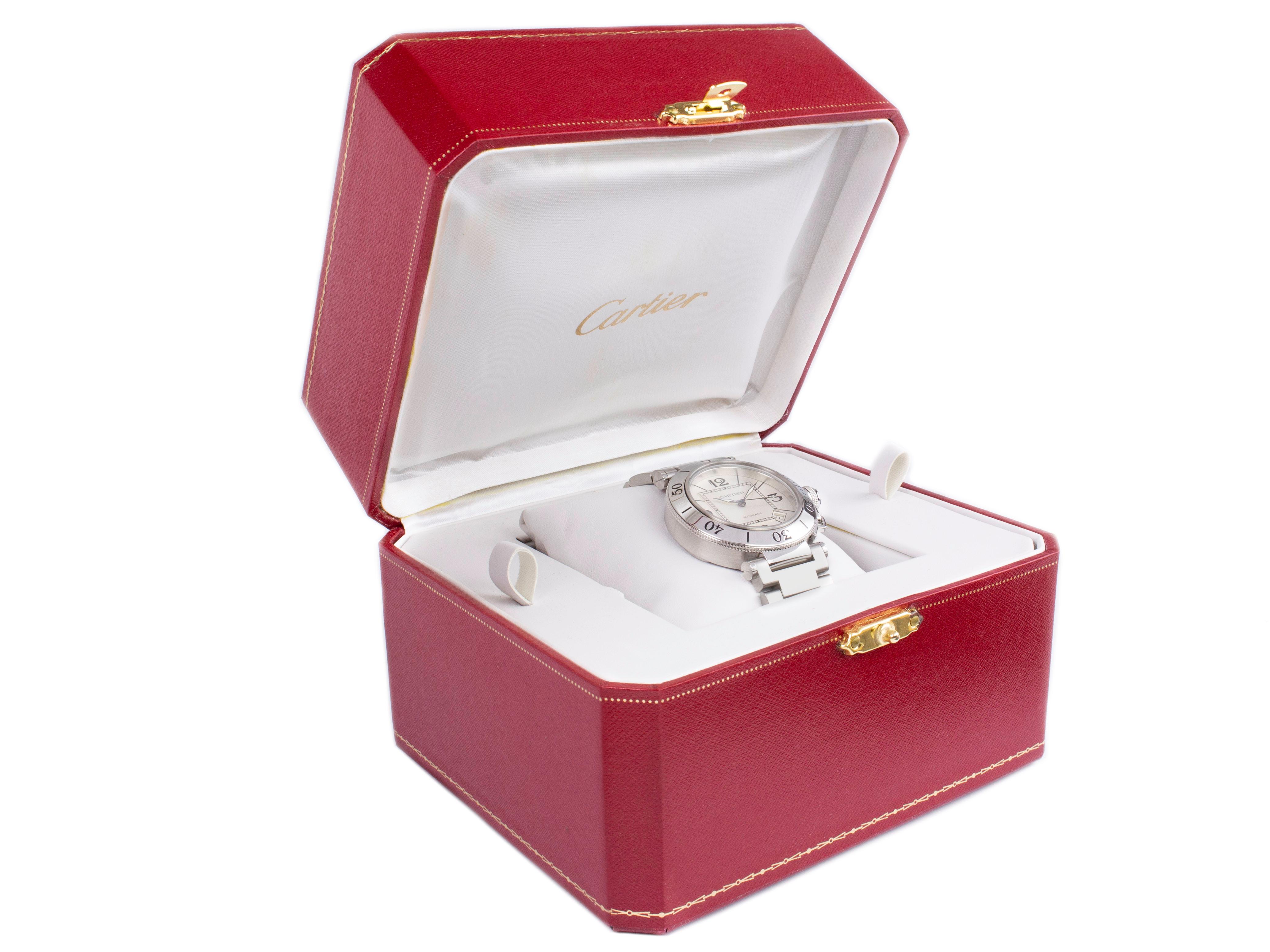 Stainless Steel Cartier Pasha Automatic Watch with a 40mm Case, Silver Dial, and Bracelet with Folding Clasp. Features include Hours, Minutes, Seconds, and Date. Comes with a Deluxe Gift Box and 2 Year Store Warranty.​

Brand	Cartier
Series	Pasha de