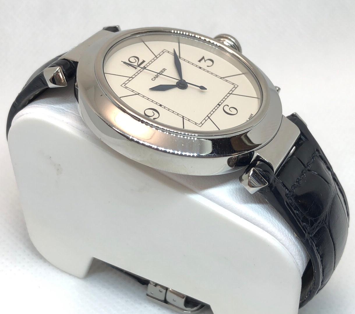 Cartier Pasha Stainless Steel Auto Watch on Leather Strap, Exhibition Case Back

•REFERENCE NO: 2730
•MOVEMENT: AUTOMATIC SELF WINDING
•CASE MATERIAL: STAINLESS STEEL
•CONDITION: LIKE NEW EXCELLENT PRE-OWNED
•CASE MEASUREMENTS: 42MM X 49MM X 9MM