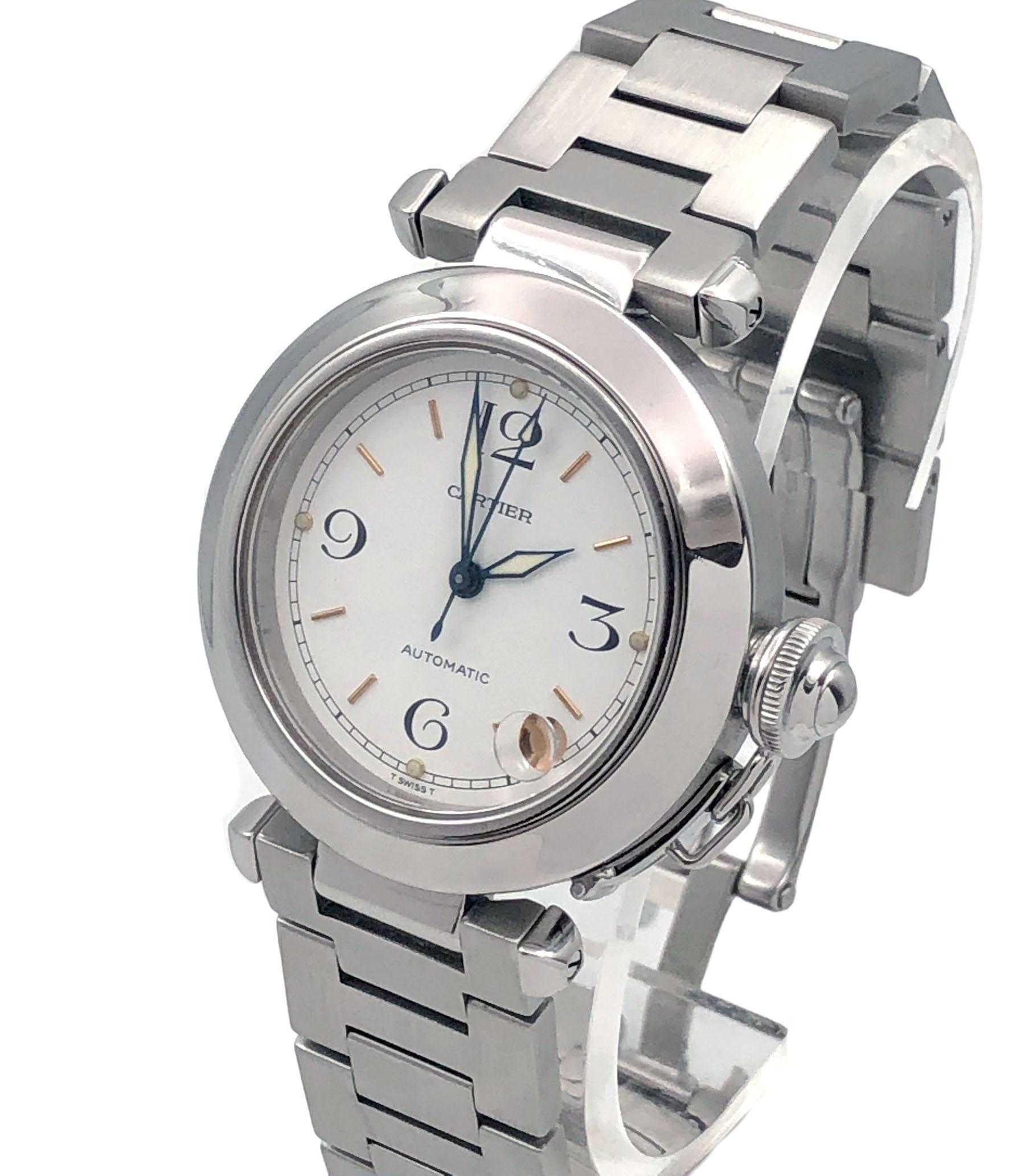 Circa 2005 Cartier Pasha C  2324 Wrist Watch,  35 M.M. Stainless Steel 3 piece water resistant case with watertight lock down Crown. Automatic, self winding movement. White dial with Calendar window at the 5 position and a sweep seconds hand. 3/4
