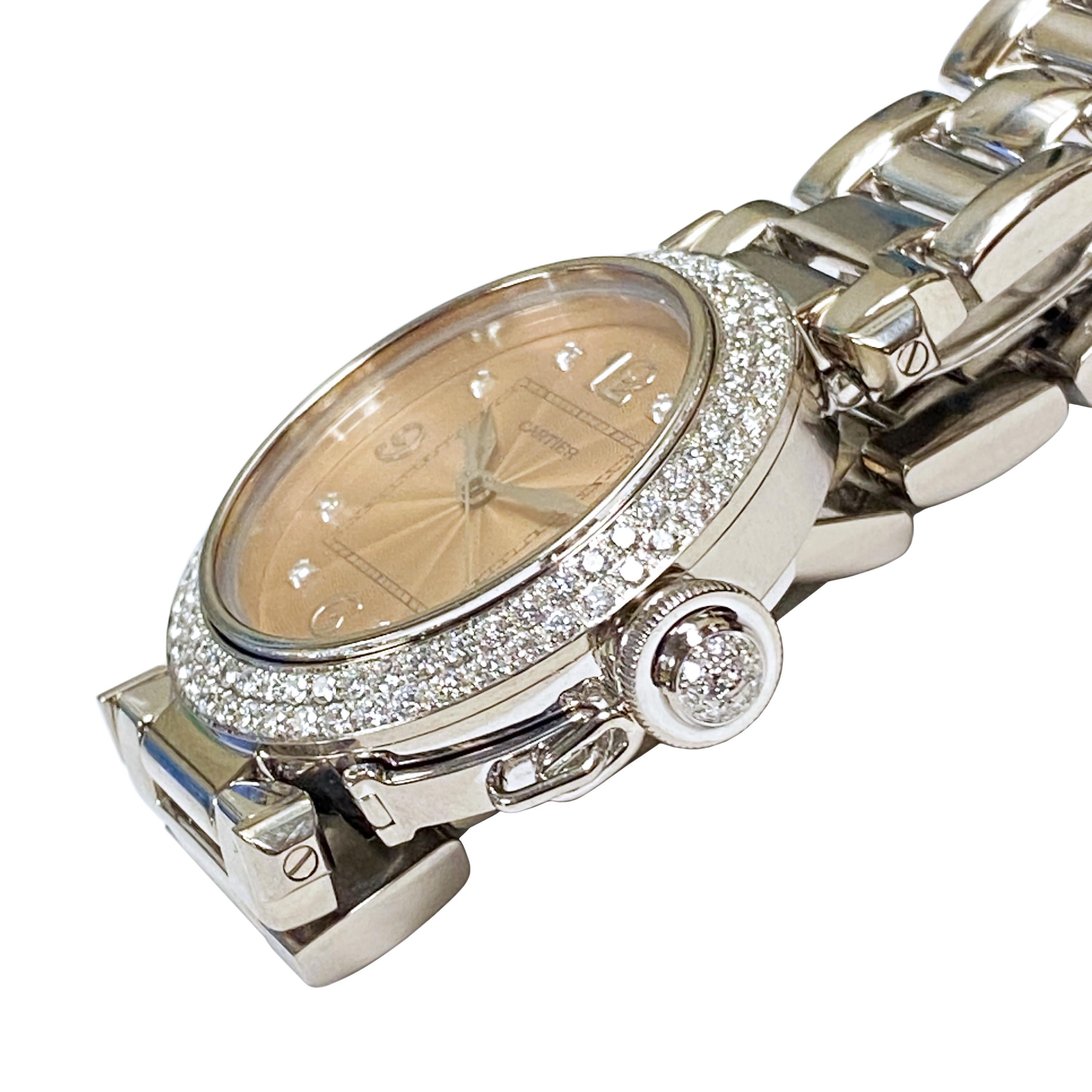 Circa 2005 Cartier Pasha 18K White Gold Wrist Watch,  35 M.M. 3 piece Water resistant case with Cartier Factory Diamond set Double row bezel totaling 2.75 Carat, Diamond set lock down crown.  Automatic, self winding movement, Engine turned Pink dial