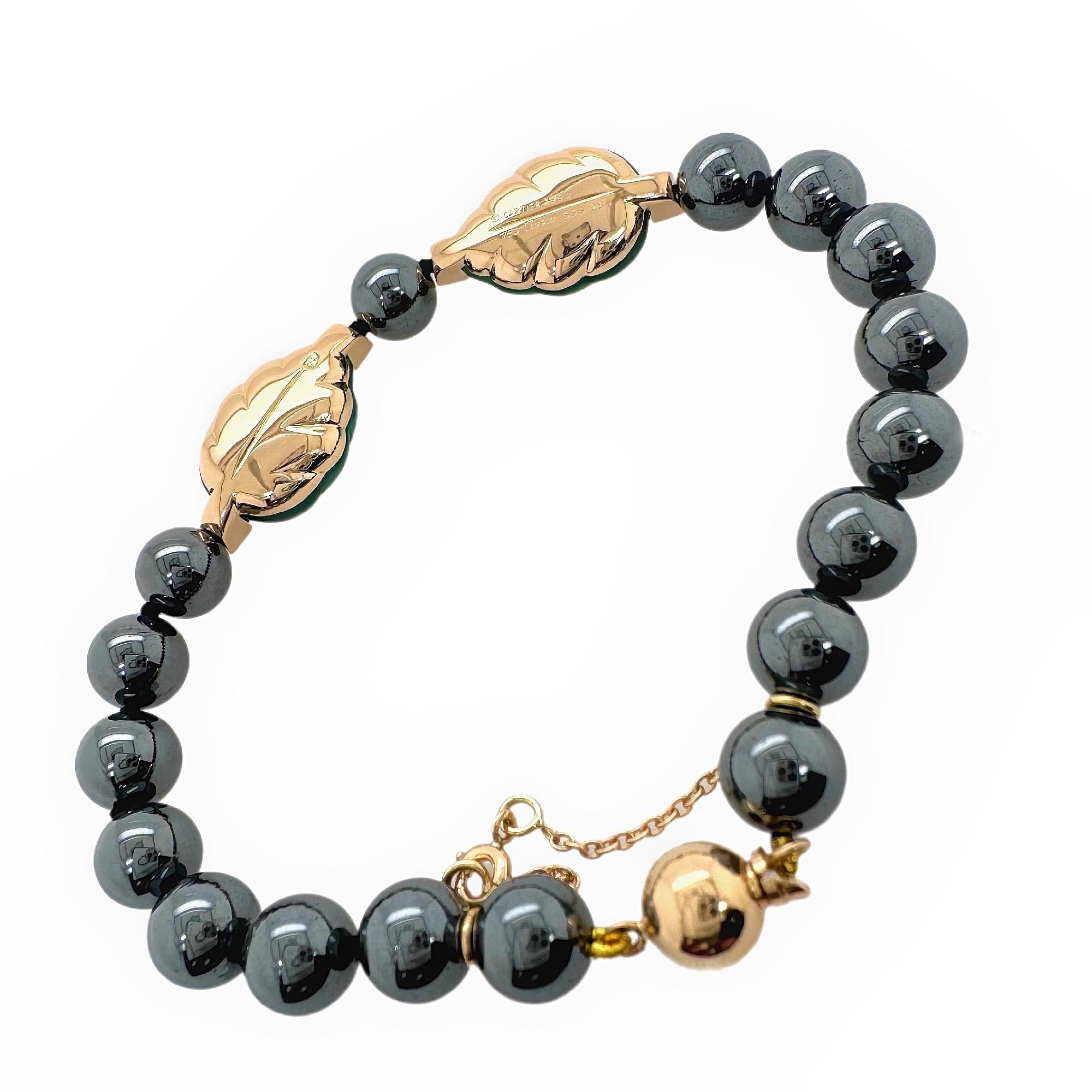 Ball Cut Cartier Patiala Hematite Beads with Carved Green Chalcedony Leaves Bracelet YG For Sale