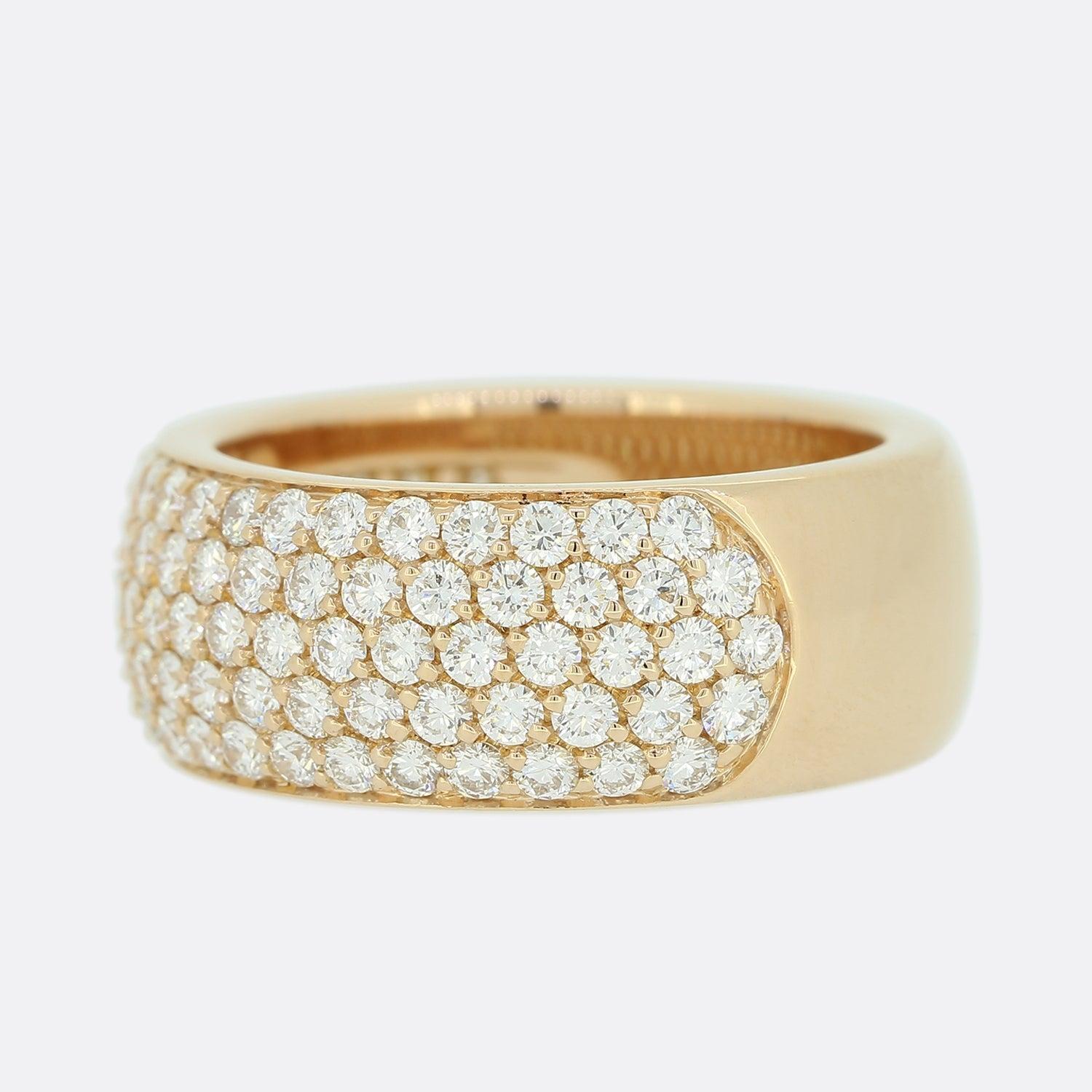 This is a wonderful 18ct rose gold, pave set diamond band ring from the luxury jewellery designer Cartier. The ring features 2.0 carats of sparkling round brilliant cut diamonds which are pave set over half of the band. As you would expect from