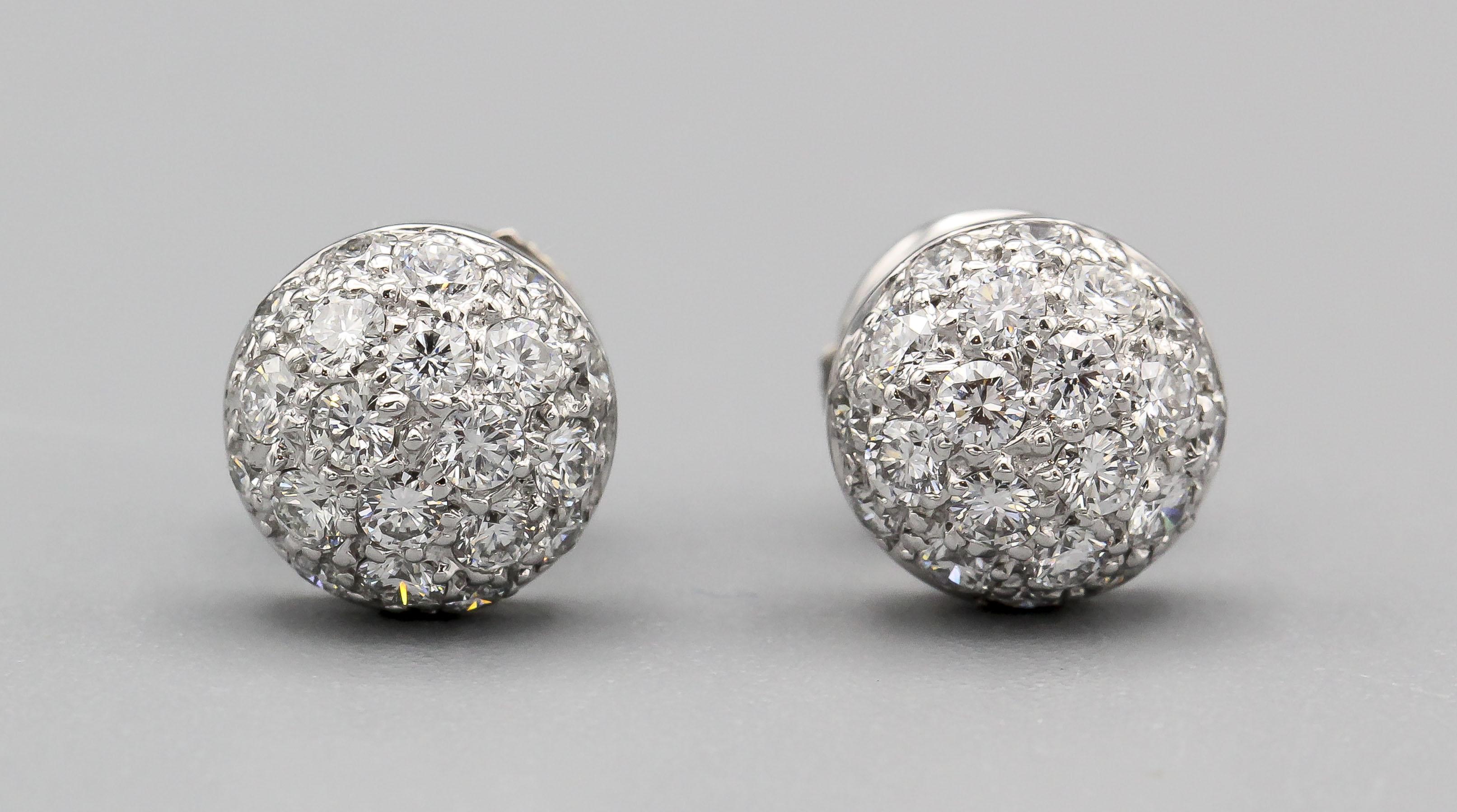 Introducing the Cartier Pavé Diamond 18 Karat White Gold Dome Earrings Studs—an exquisite expression of elegance and luxury that encapsulates Cartier's legacy of sophistication and exceptional craftsmanship. These earrings are a true testament to