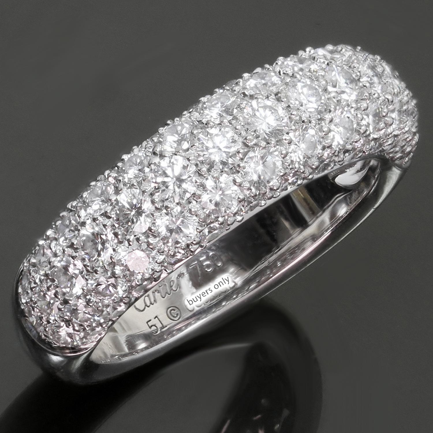 This gorgeous authentic vintage Cartier ring is crafted in 18k white gold and pave-set with approximately 70 round brilliant D-E-F VVS1-VVS2 diamonds weighing an estimated 1.40 carats. Made in France circa 1990s. Measurements: 0.23