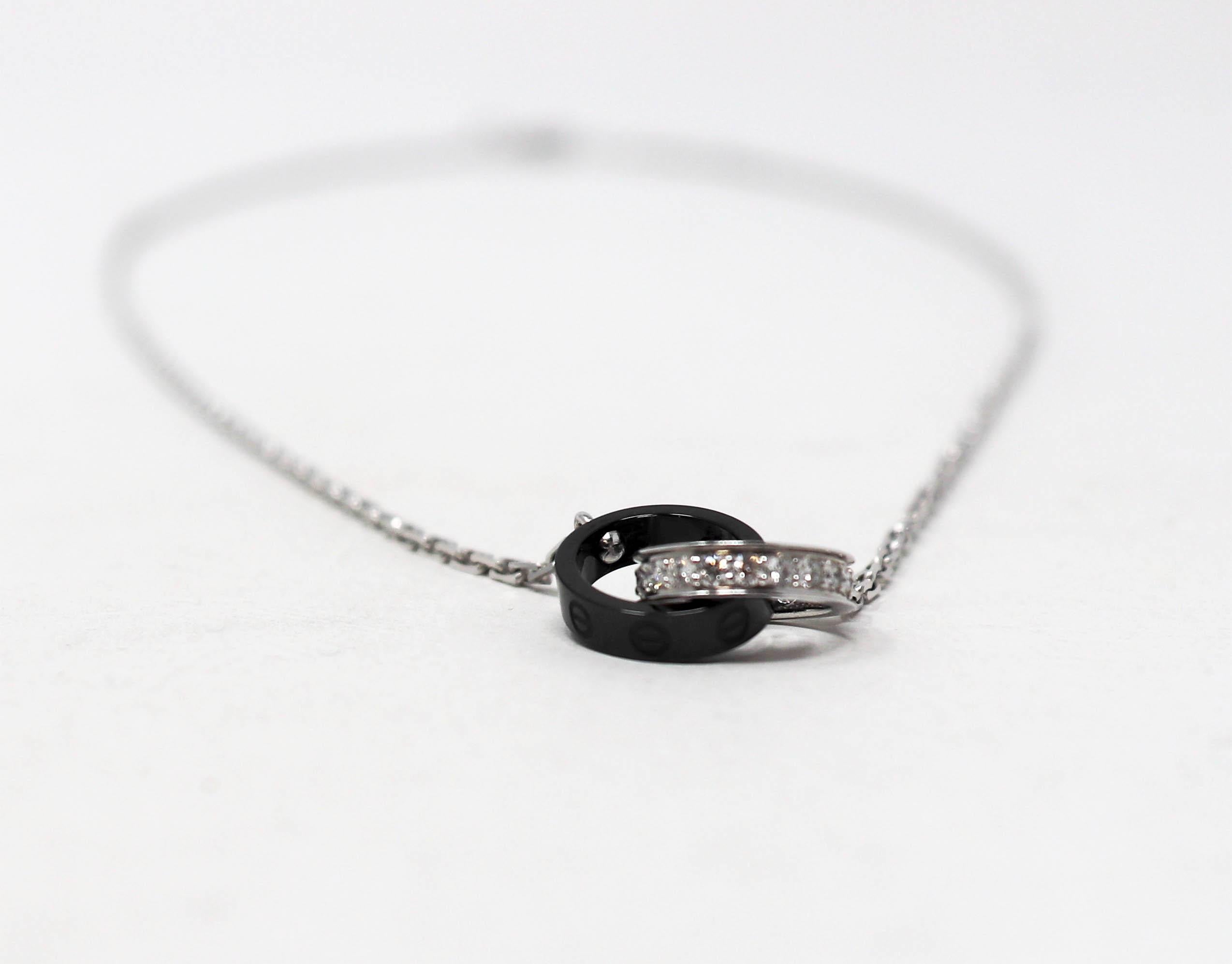 Cartier Pave Diamond and Black Ceramic Baby Love Double Ring Pendant Necklace In Good Condition For Sale In Scottsdale, AZ