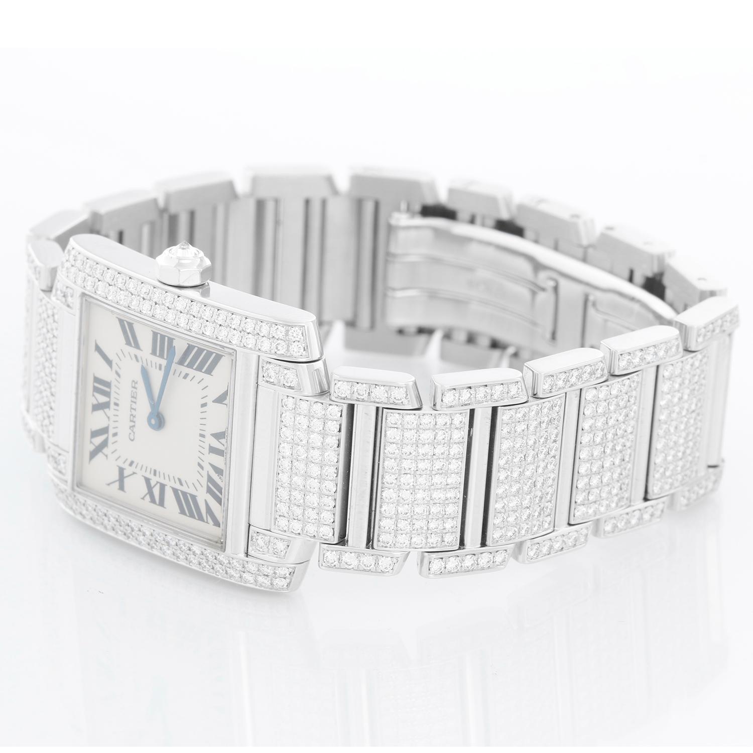 Cartier Pave Diamond Tank Francaise 18k White Gold Midsize Watch WE1009SD - Quartz. 18k white gold case with pave diamond bezel ( 25 x 30 mm ) . Silvered with black Roman numerals. 18k white gold and pave diamond bracelet (will fit apx. 6-1/4-in.