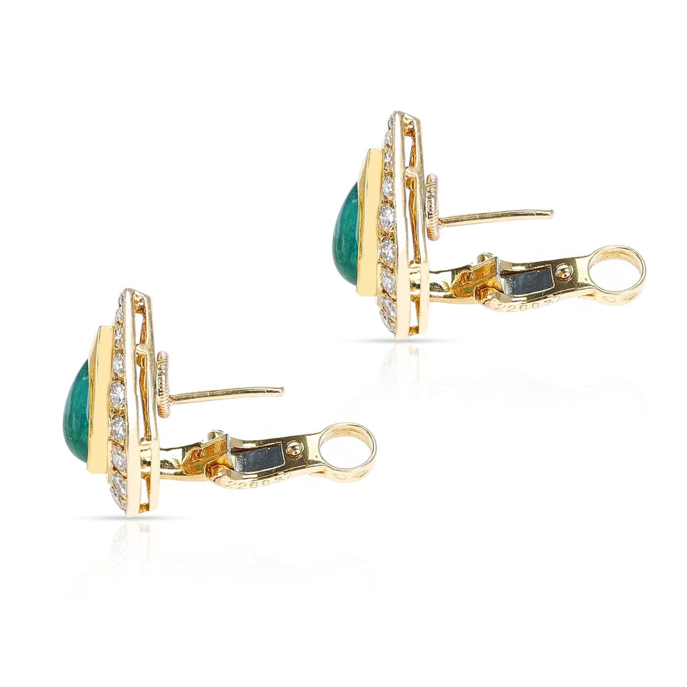A pair of Cartier Pear Shape Emerald and Diamond Earrings made in 18 Karat Yellow Gold. The total weight of the earrings is 8.10 grams. The length of the earring is 0.75 inches. 

